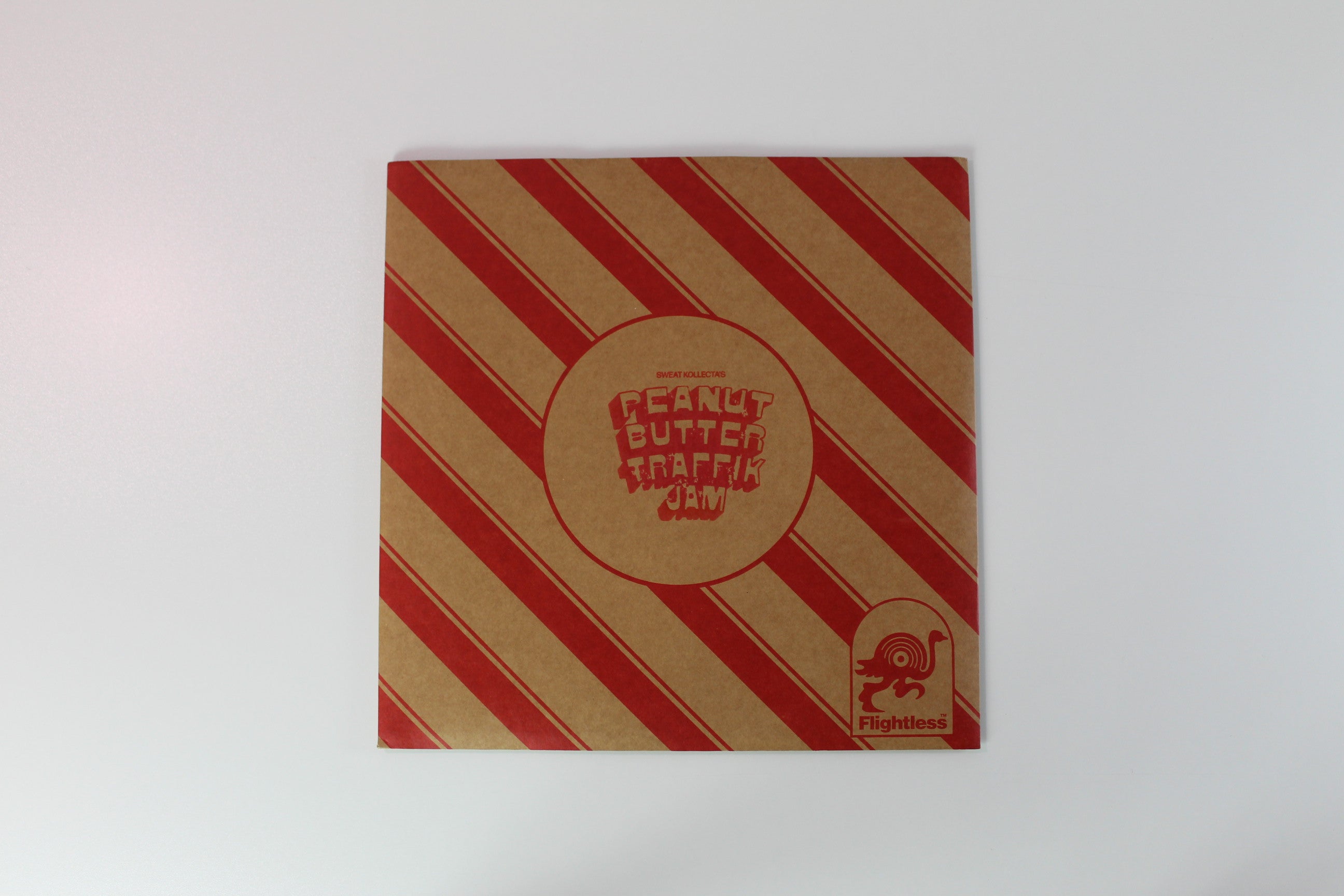 Traffik Island - Sweat Kollecta's Peanut Butter Traffik Jam Ltd. Transparent Jammy Red Vinyl on Flightless