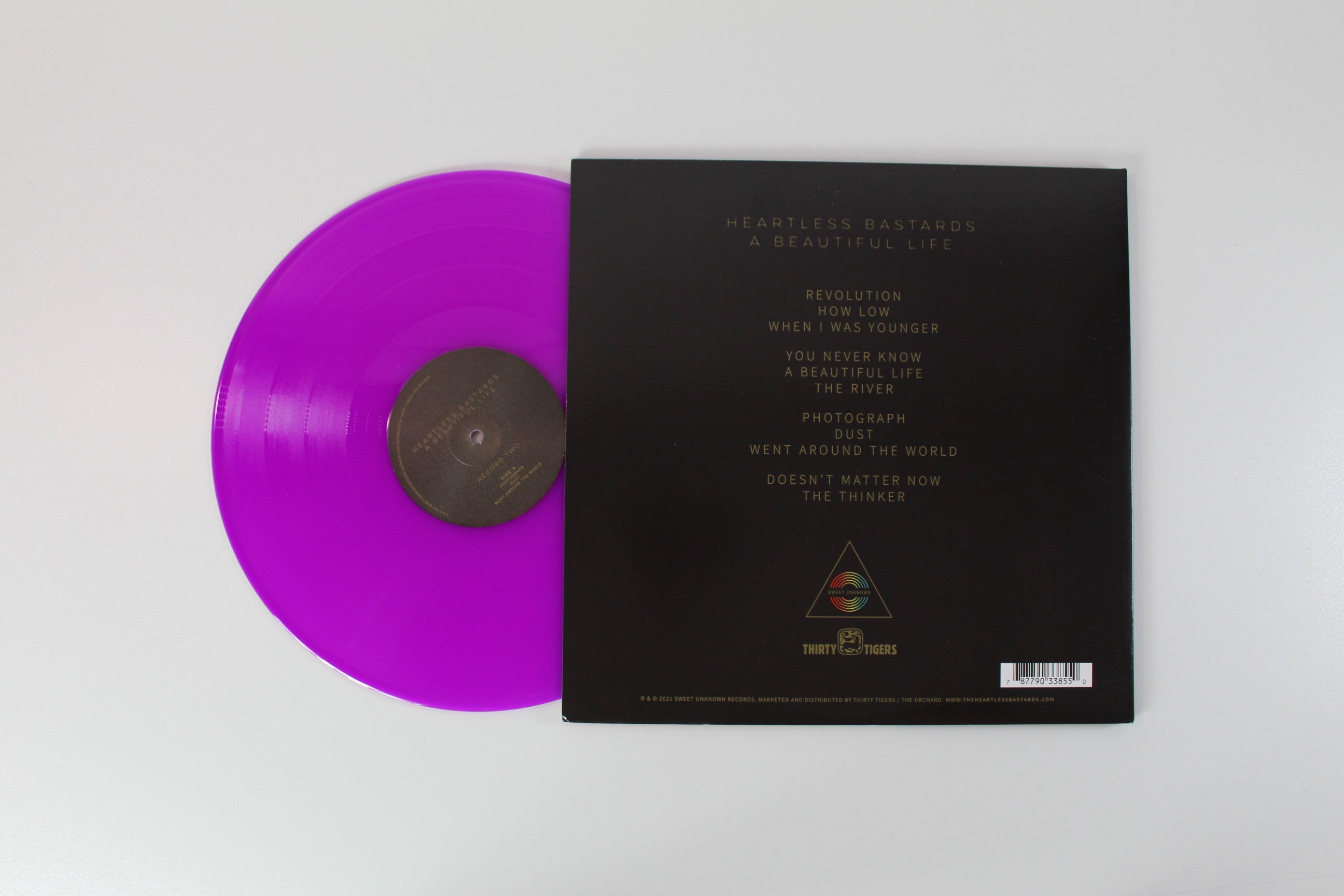 Heartless Bastards - A Beautiful Life on Thirty Tigers - Neon Violet Vinyl - Signed