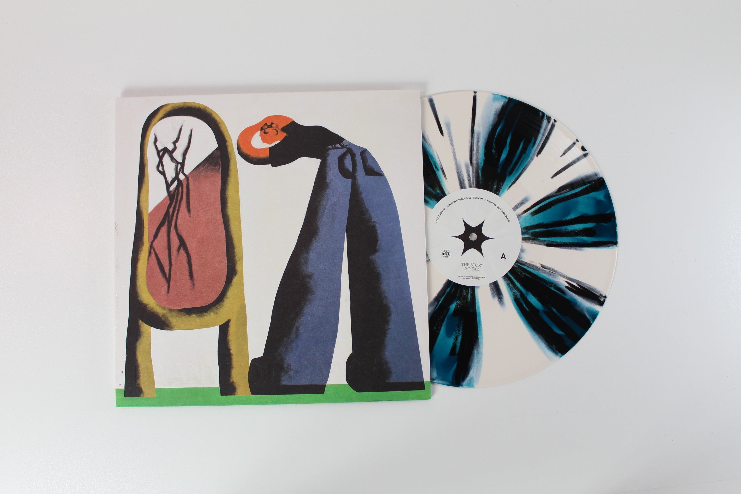 The Story So Far - I Want To Disappear on Pure Noise Records – Bone & Seablue Pinwheel With Black Splatter Colored Vinyl