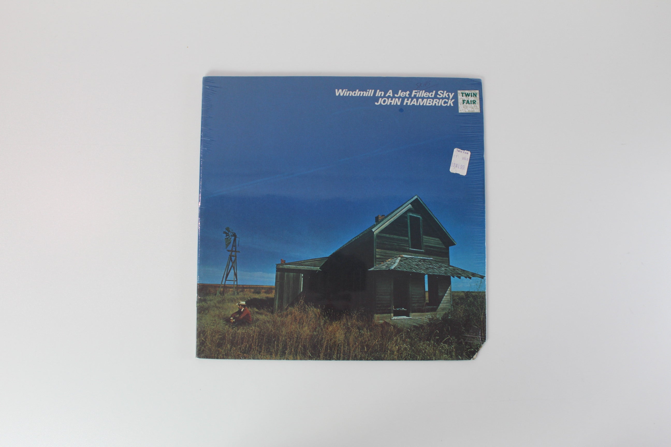 John Hambrick - Windmill In A Jet Filled Sky on Brown Bag Breaks Samples Sealed