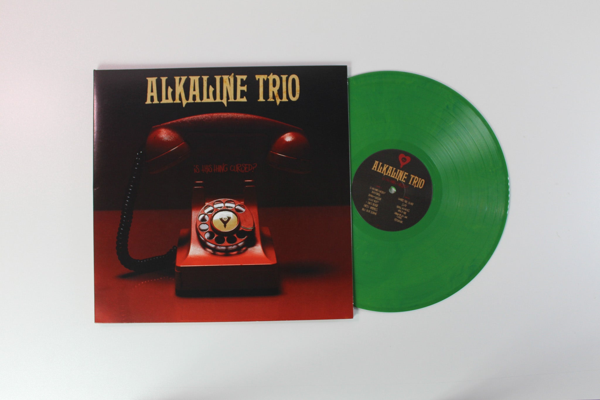 Alkaline Trio - Is This Thing Cursed? on Epitaph - Green Vinyl