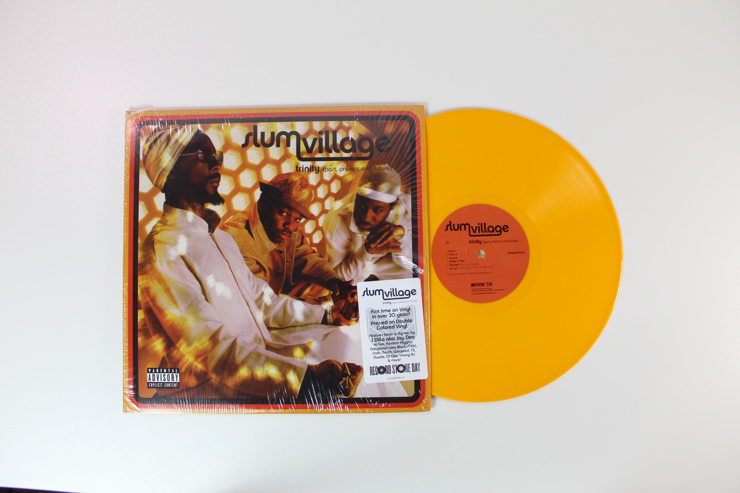 Slum Village - Trinity (Past, Present And Future) on Ne'Astra Music Group - Yellow and Tangerine Colored Vinyl