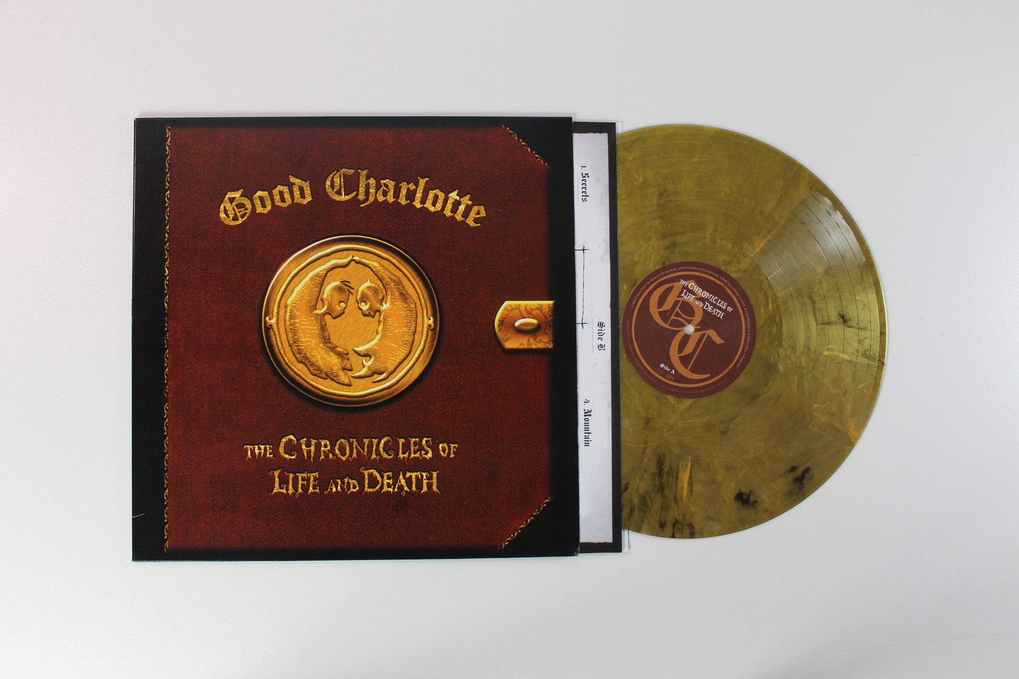 Good Charlotte - The Chronicles Of Life And Death Ltd/ Metallic Gold Vinyl Reissue on Epic