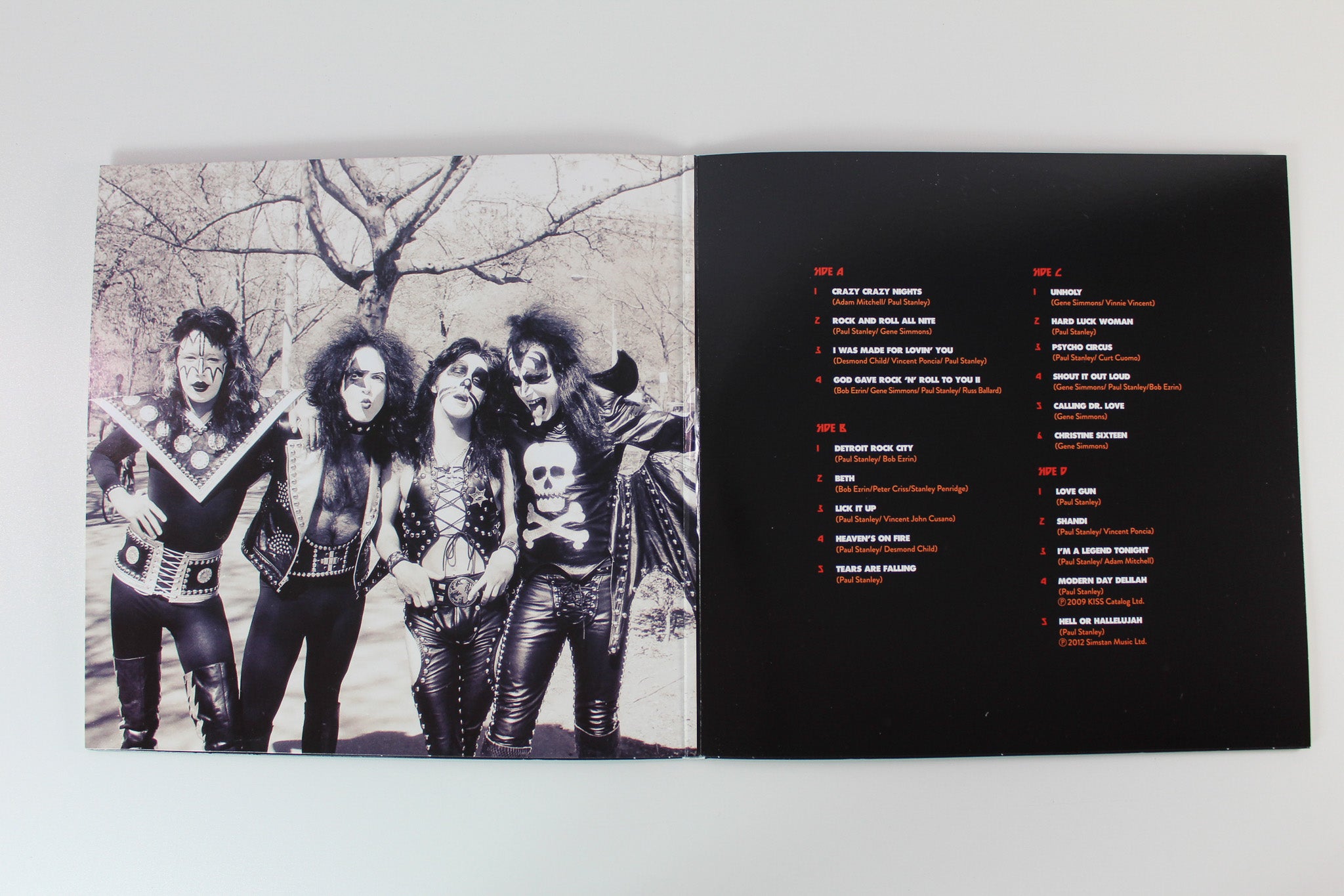 Kiss - Kissworld: The Best Of Kiss on Mercury UMe Red With Yellow Splatter Reissue