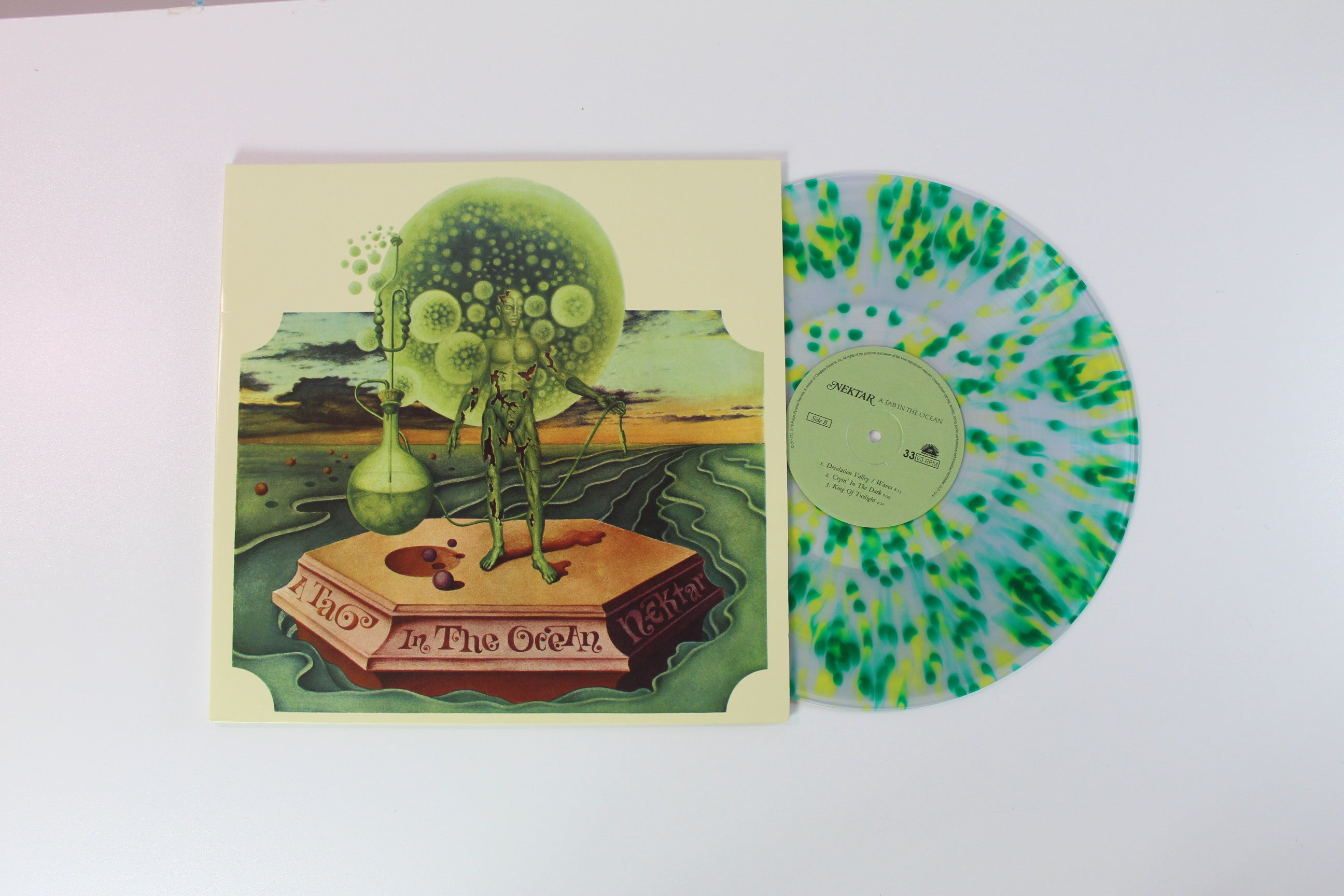 Nektar - A Tab In The Ocean Ltd. Reissue Splatter Green & Yellow Vinyl on Purple Pyramid