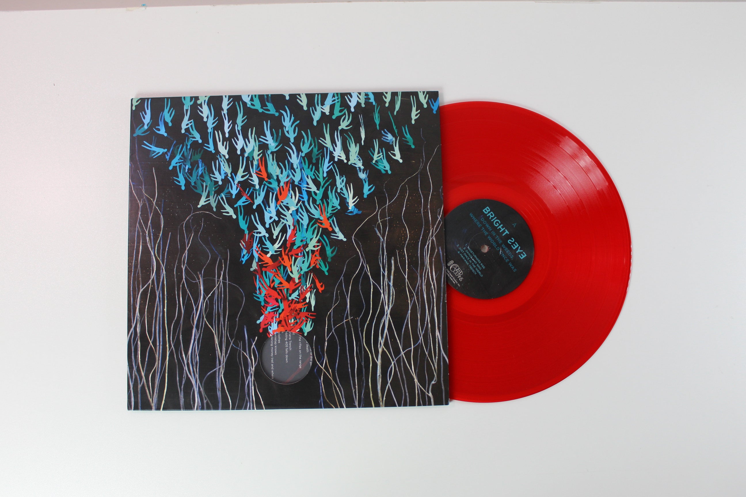 Bright Eyes - Down In The Weeds Where The World Once Was on Dead Oceans Red & Orange Translucent