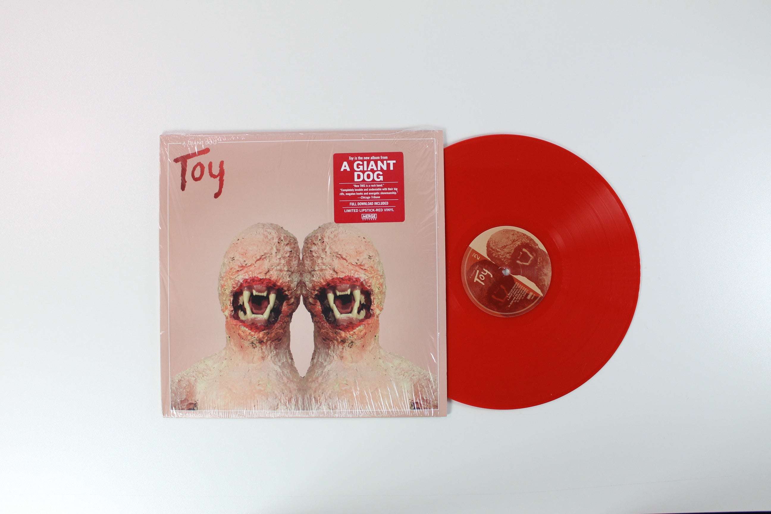 A Giant Dog - Toy on Merge Ltd Lipstick Red