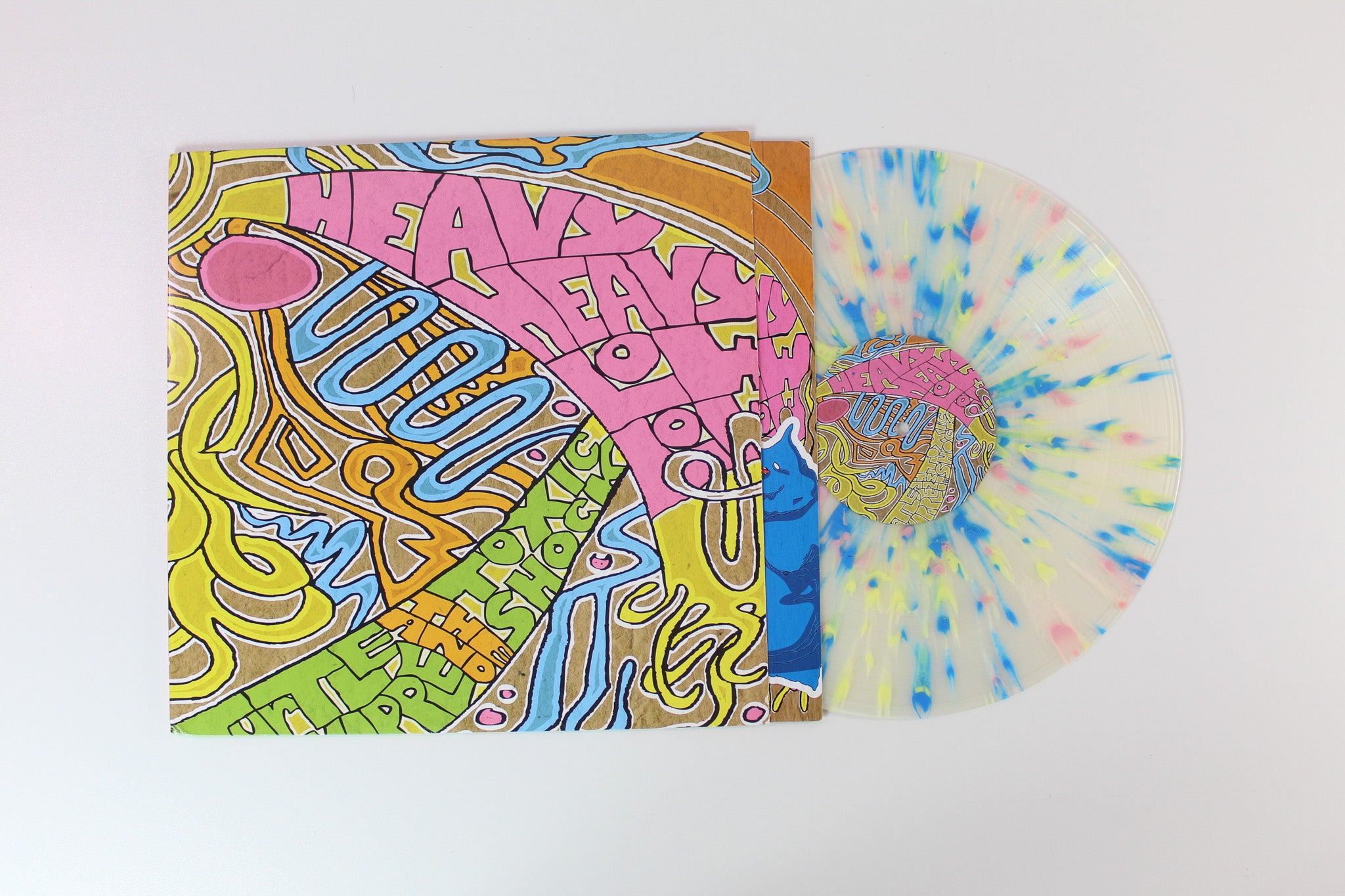 Heavy Heavy Low Low - Turtle Nipple And The Toxic Shock on Suburban Clear w/ Pink Blue Yellow and Orange Splatter