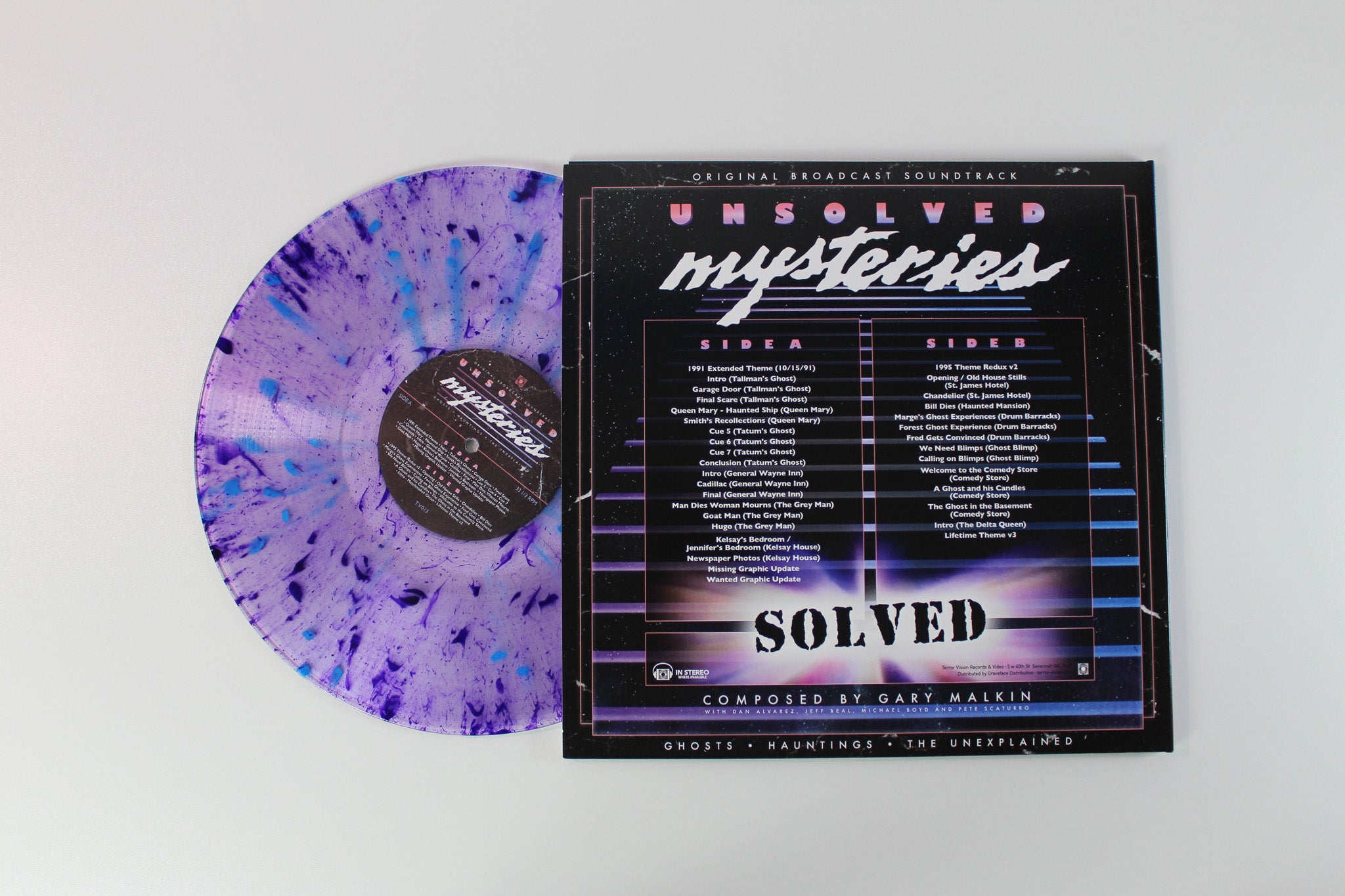 Gary Remal Malkin - Unsolved Mysteries: Ghosts • Hauntings • The Unexplained (Original Broadcast Soundtrack) on Terror Vision Purple Translucent w/ Purple Smoke & Teal Splatter
