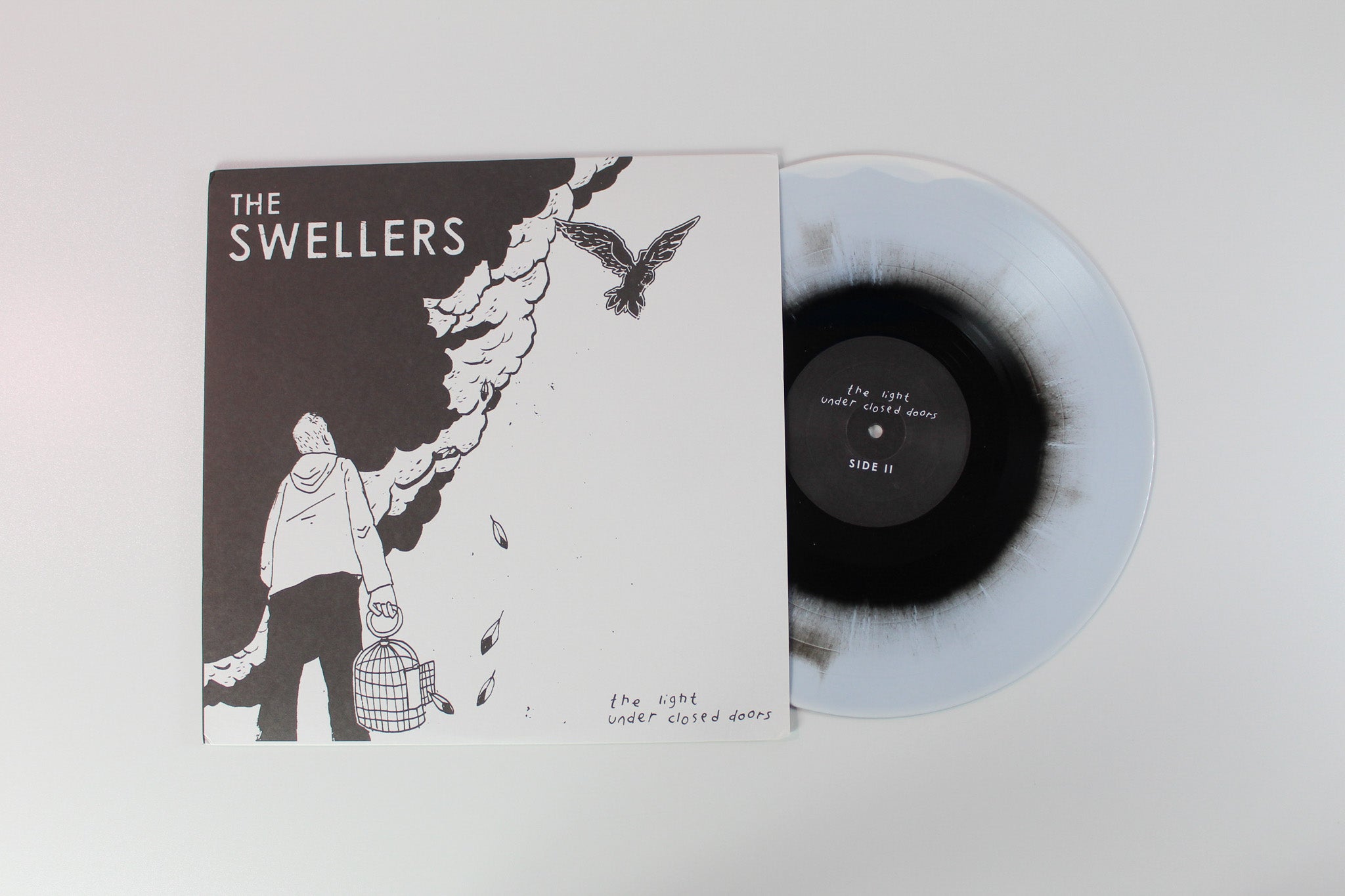 The Swellers - The Light Under Closed Doors on No Sleep Records Black/White Haze Vinyl