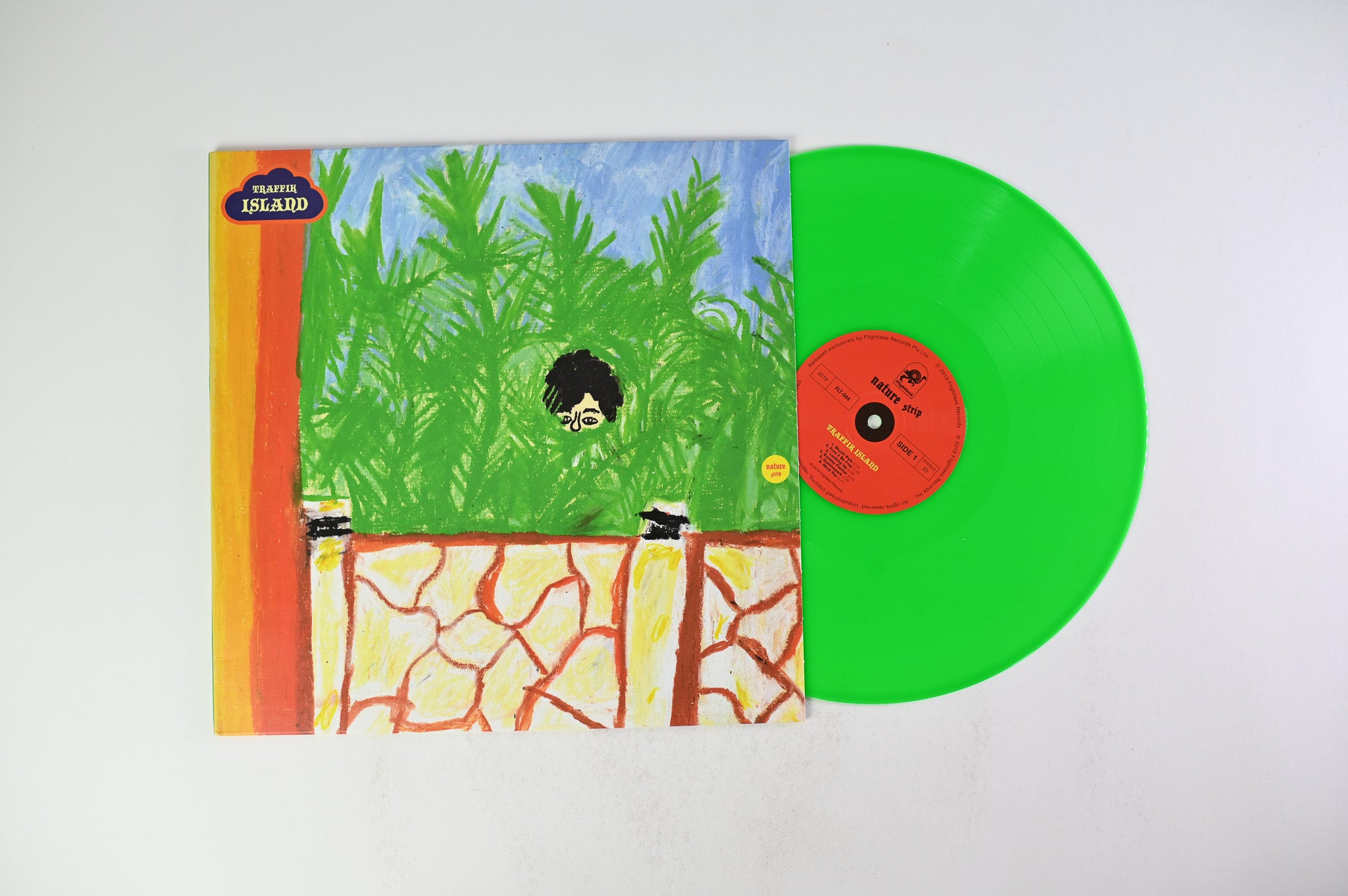 Traffik Island - Nature Strip on Flightless Ltd Green Grass