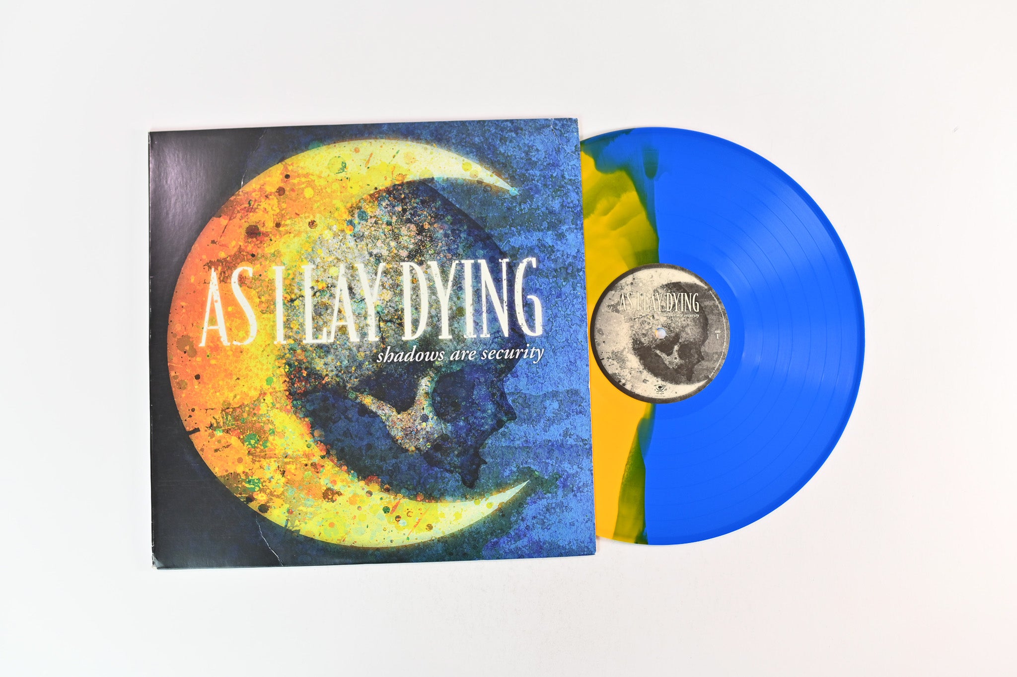 As I Lay Dying - Shadows Are Security on Metal Blade Ltd Bi-color Yellow/Blue Opaque Reissue
