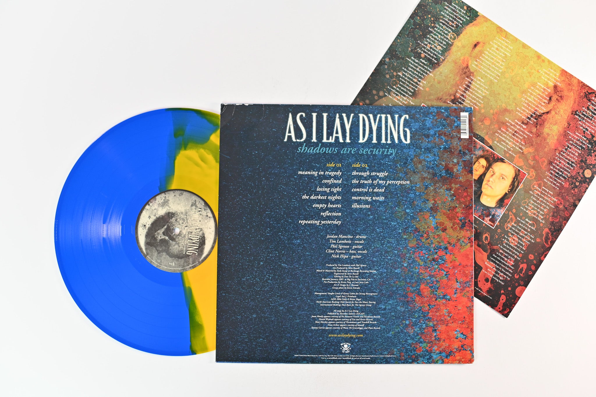 As I Lay Dying - Shadows Are Security on Metal Blade Ltd Bi-color Yellow/Blue Opaque Reissue