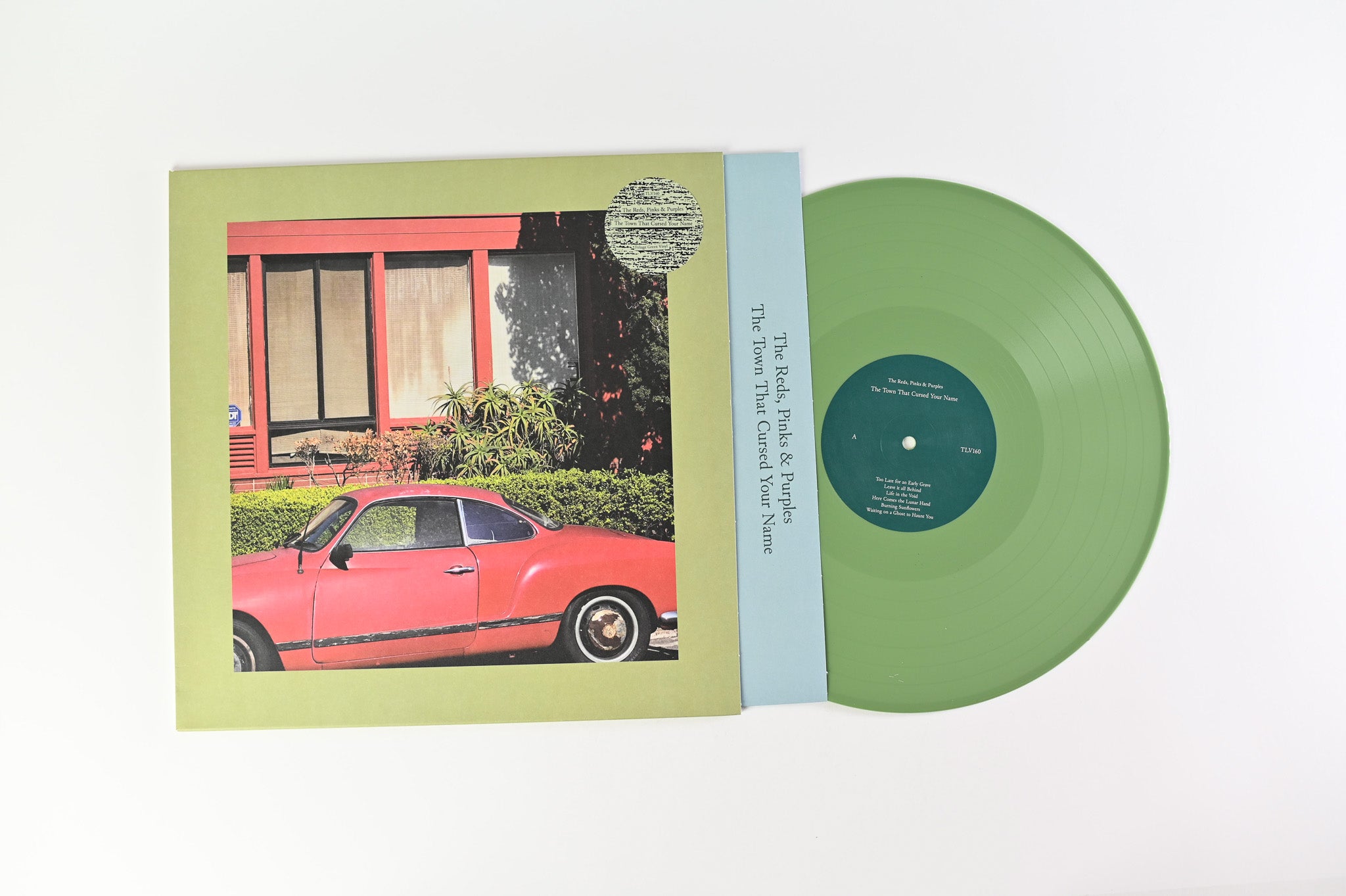 The Reds, Pinks And Purples - The Town That Cursed Your Name on Tough Love Records Foliage Green Vinyl