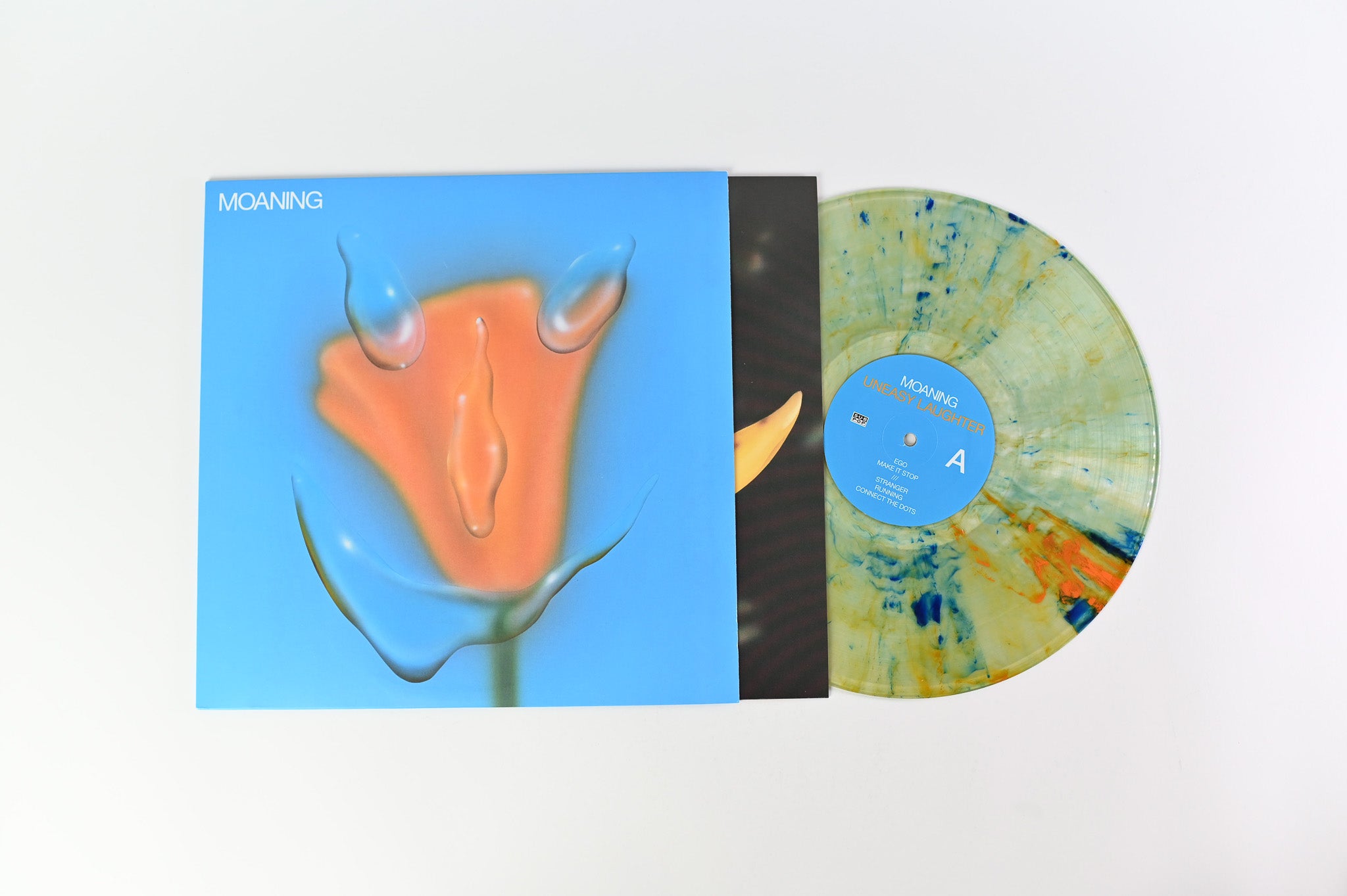 Moaning - Uneasy Laughter on Sub Pop - Clear with Blue, Yellow, and Orange Splatter