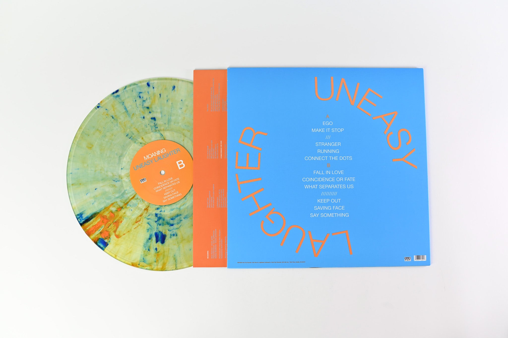 Moaning - Uneasy Laughter on Sub Pop - Clear with Blue, Yellow, and Orange Splatter