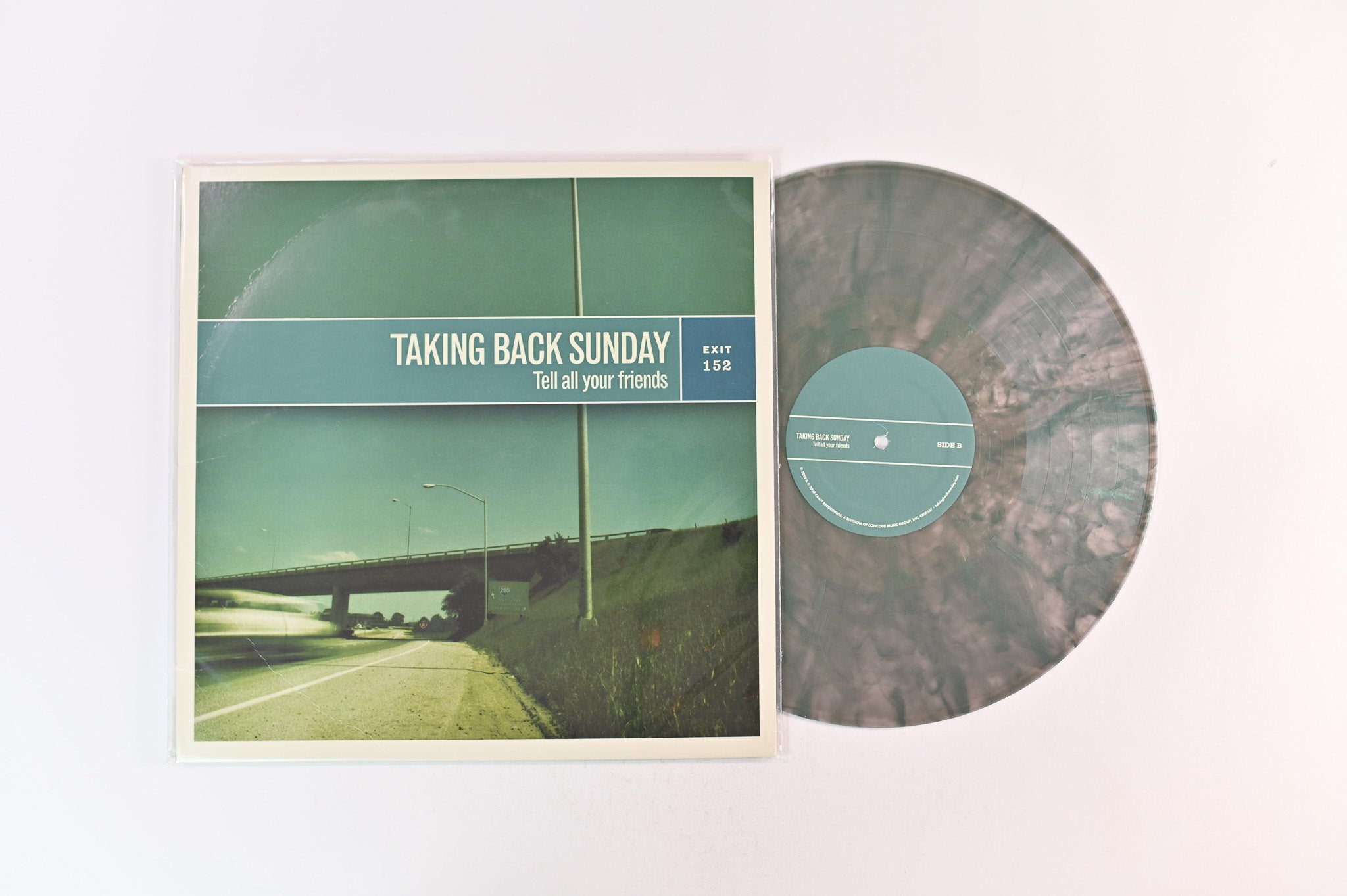 Taking Back Sunday - Tell All Your Friends on Craft Recordings Ltd Green Iridescent Vinyl Reissue