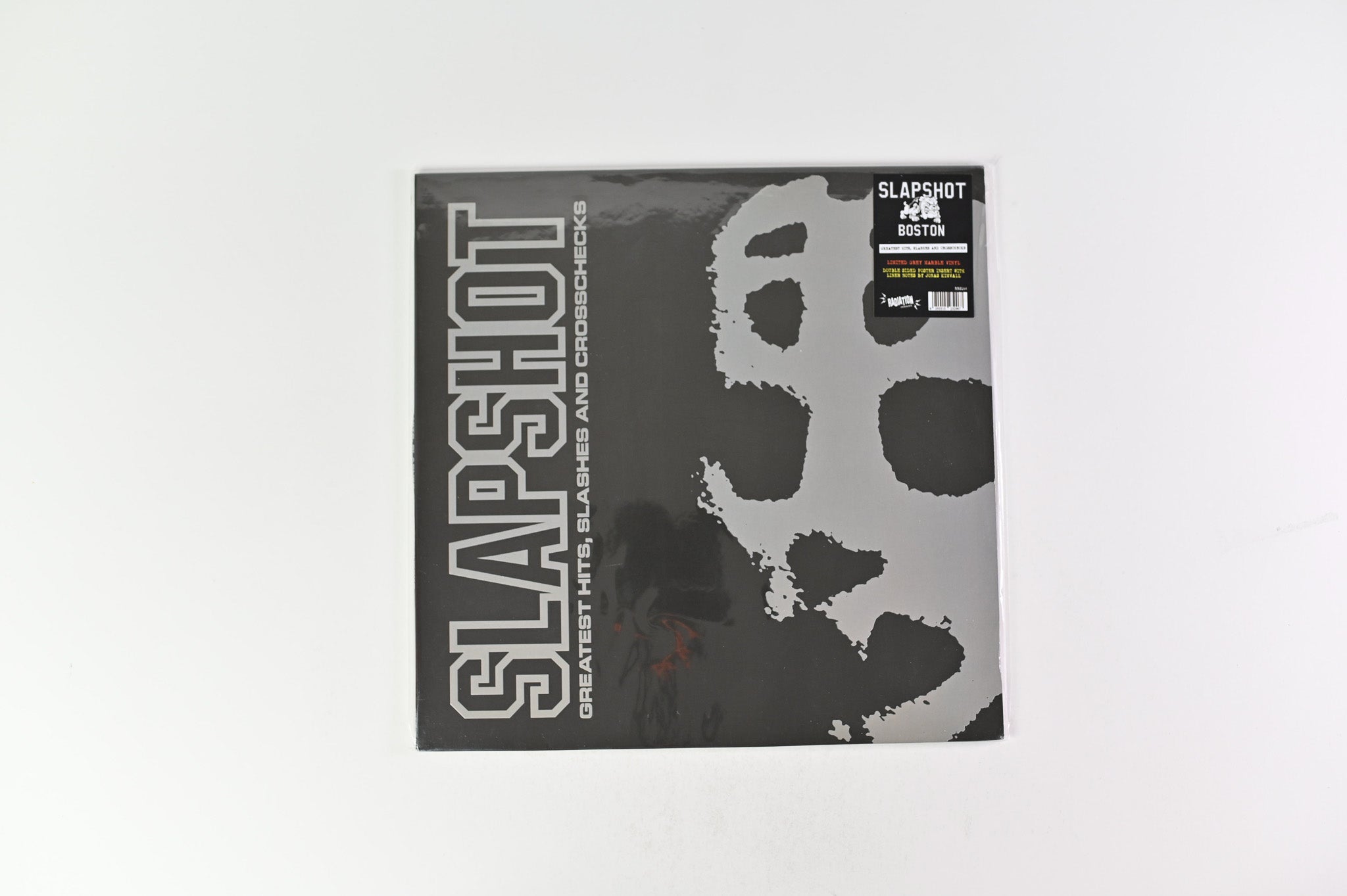 Slapshot - Greatest Hits, Slashes And Crosschecks on Radiation Reissues Ltd Grey Marble