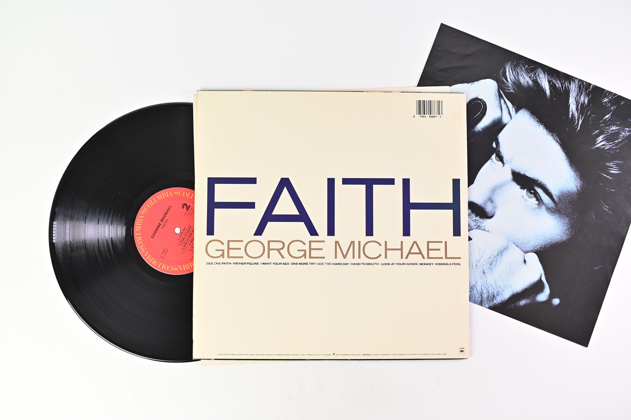 George Michael - Faith on Columbia Symbol Cover
