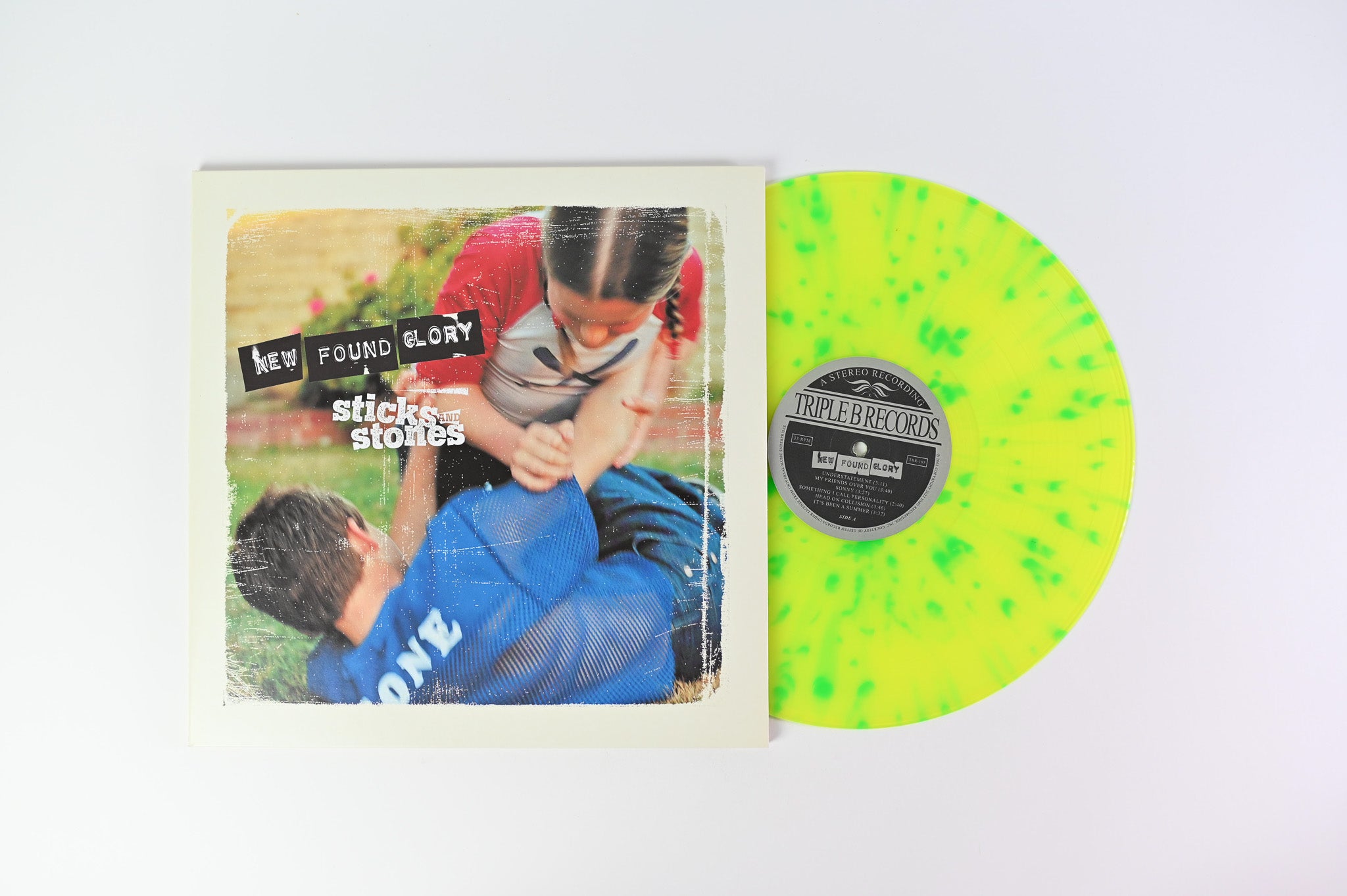 New Found Glory - Sticks And Stones on Triple B Ltd Yellow / Green Splatter Reissue