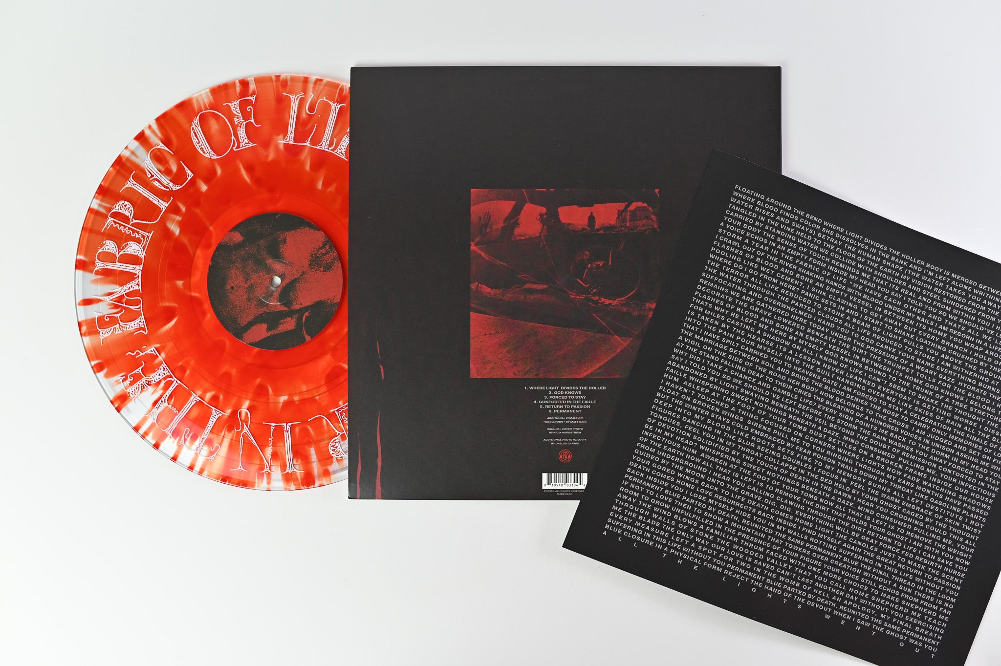 Knocked Loose - A Tear In The Fabric Of Life on Pure Noise Red / Clear Splatter