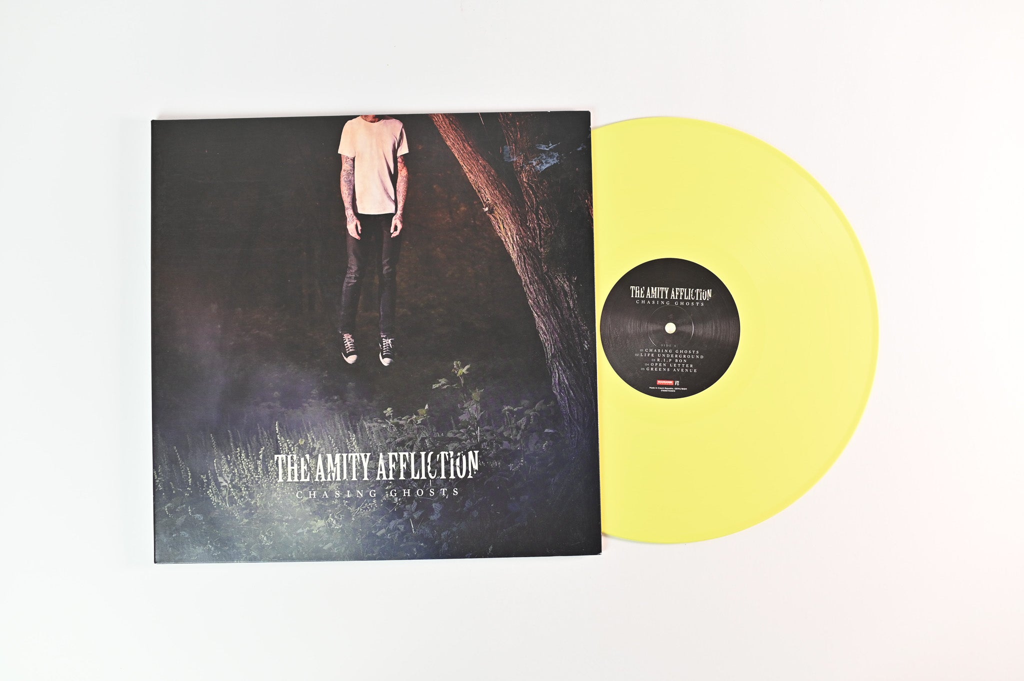 The Amity Affliction - Chasing Ghosts on UNFD / Roadrunner Records - Yellow Vinyl