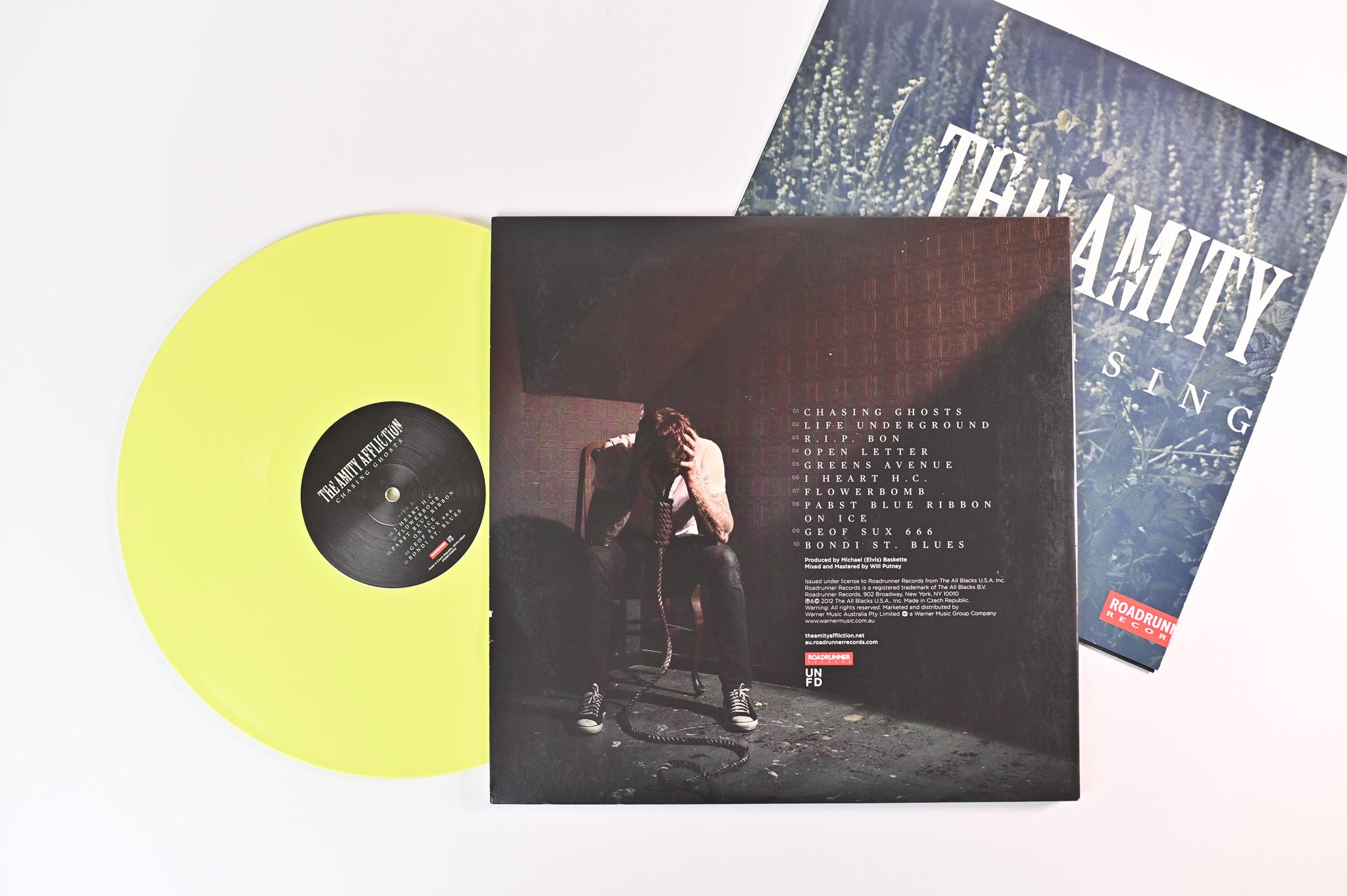 The Amity Affliction - Chasing Ghosts on UNFD / Roadrunner Records - Yellow Vinyl