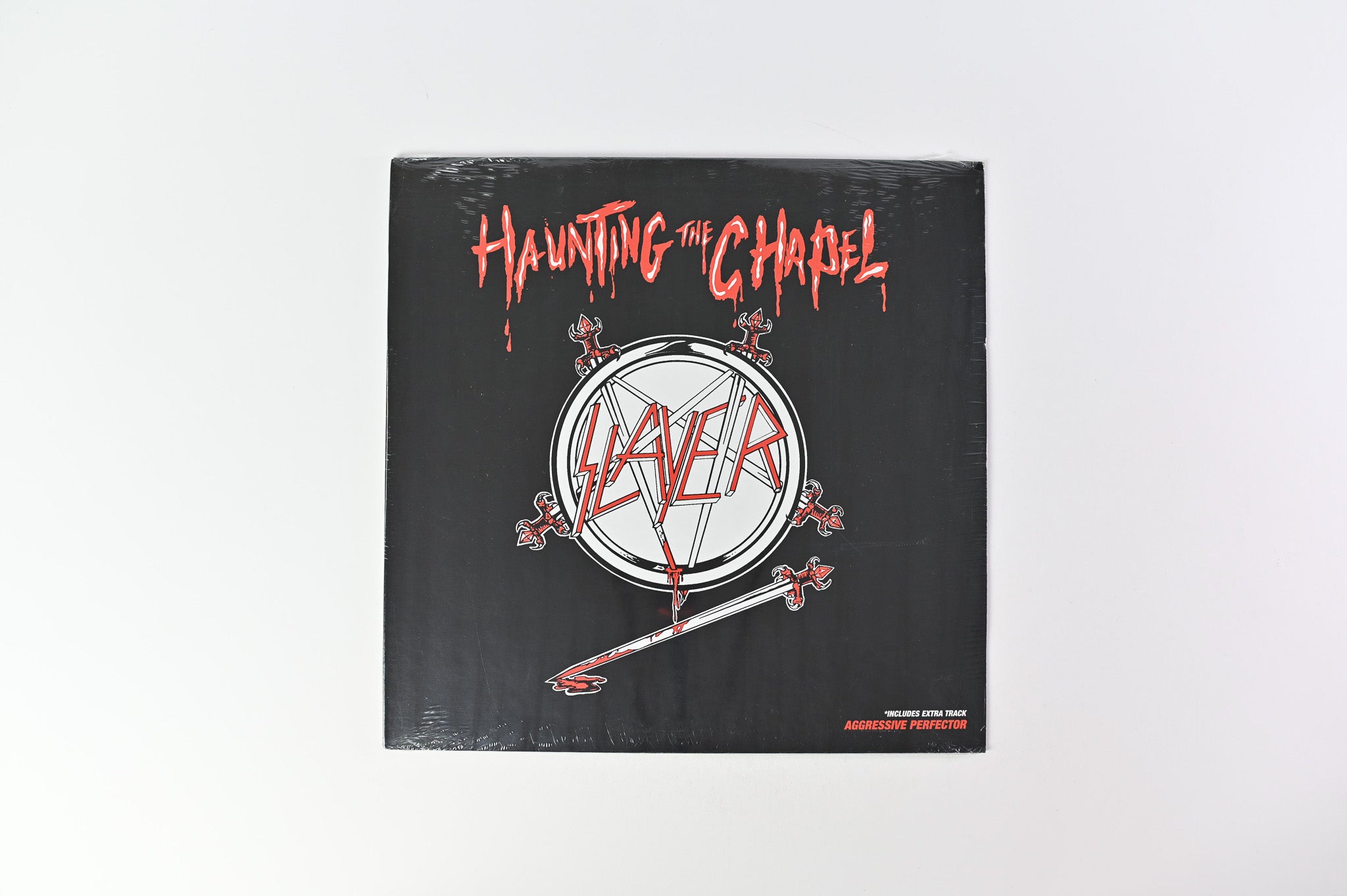Slayer - Haunting The Chapel on Metal Blade Clear w/Blood Splatter Reissue Sealed