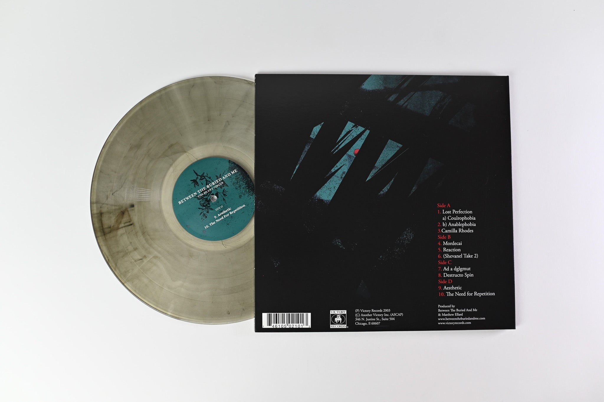 Between The Buried And Me - The Silent Circus on Victory Ltd Clear Black Smoke Repress