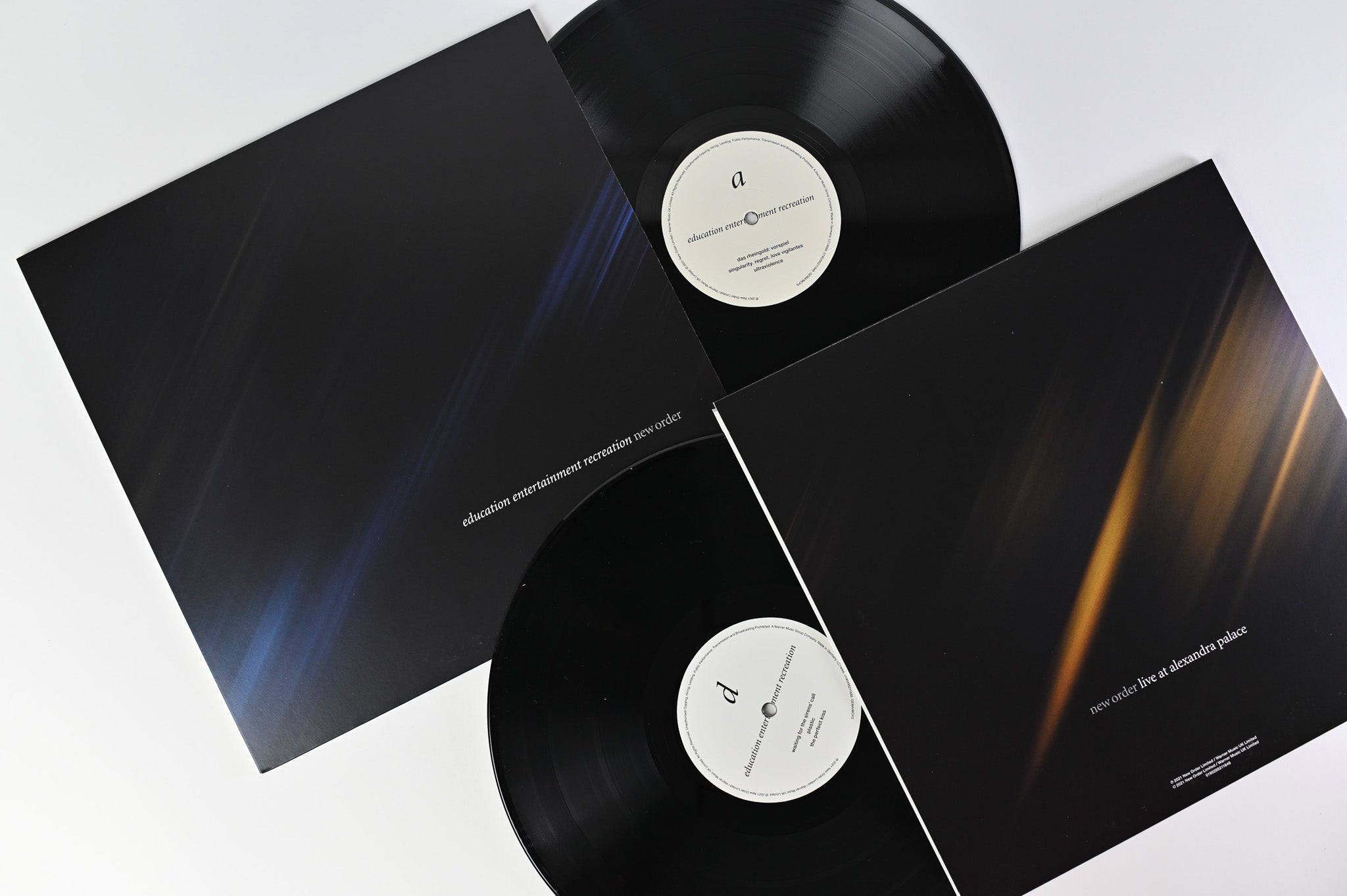 New Order - Education Entertainment Recreation on Warner