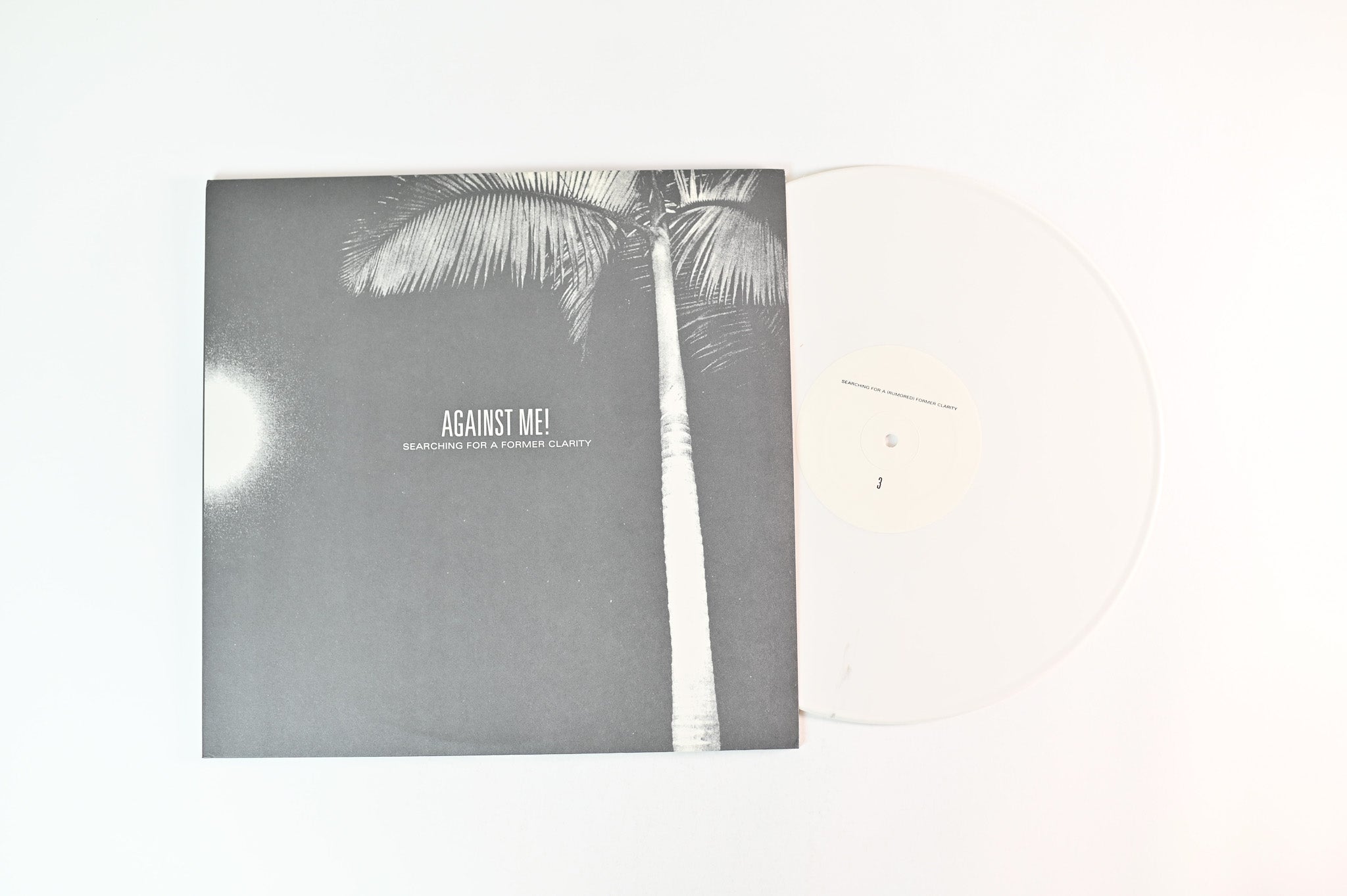 Against Me! - Searching For A Former Clarity on Fat Wreck Chords Black / White Vinyl Reissue