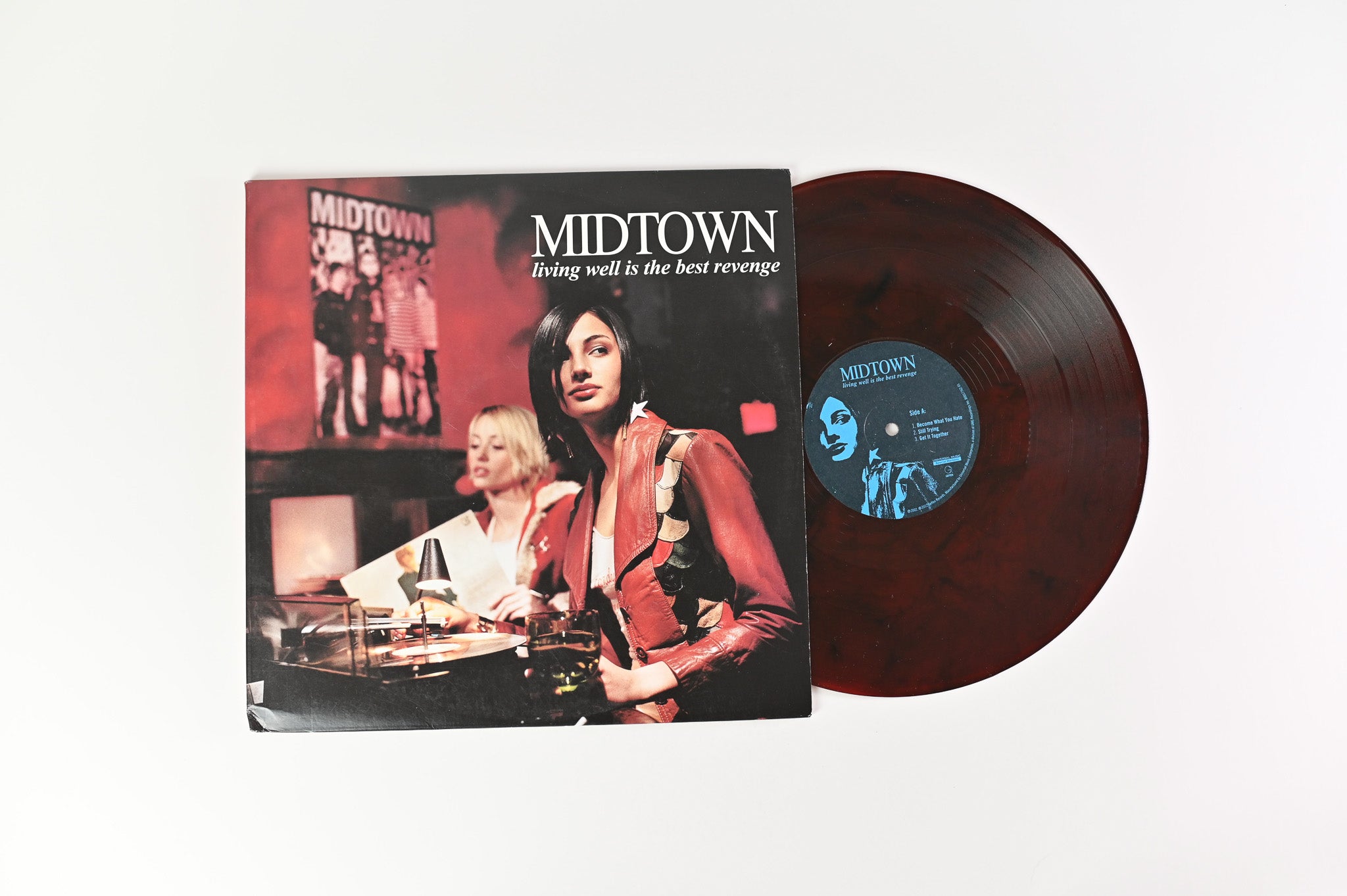 Midtown - Living Well Is The Best Revenge on Universal Red Translucent w/Black Swirl