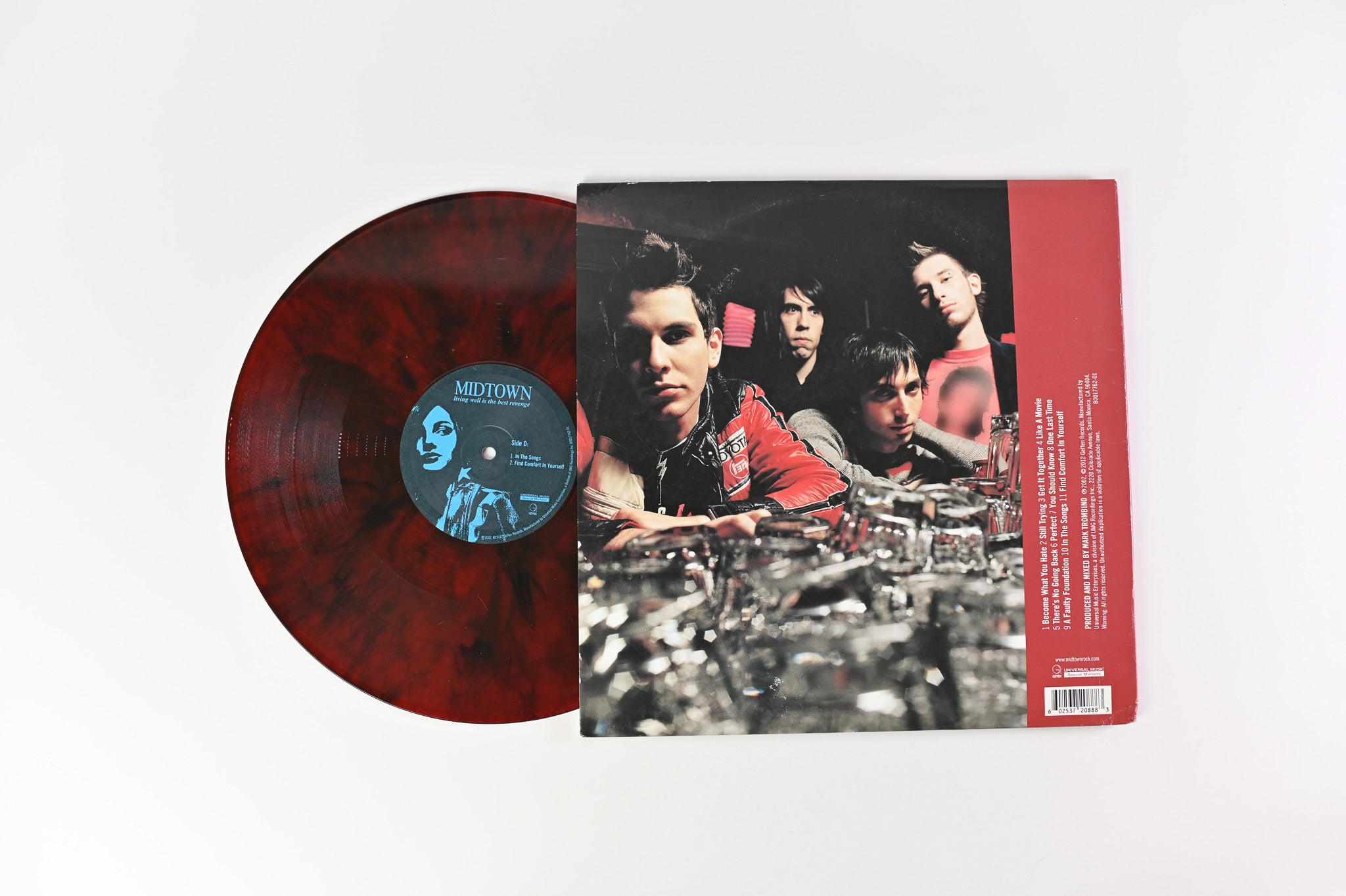 Midtown - Living Well Is The Best Revenge on Universal Red Translucent w/Black Swirl