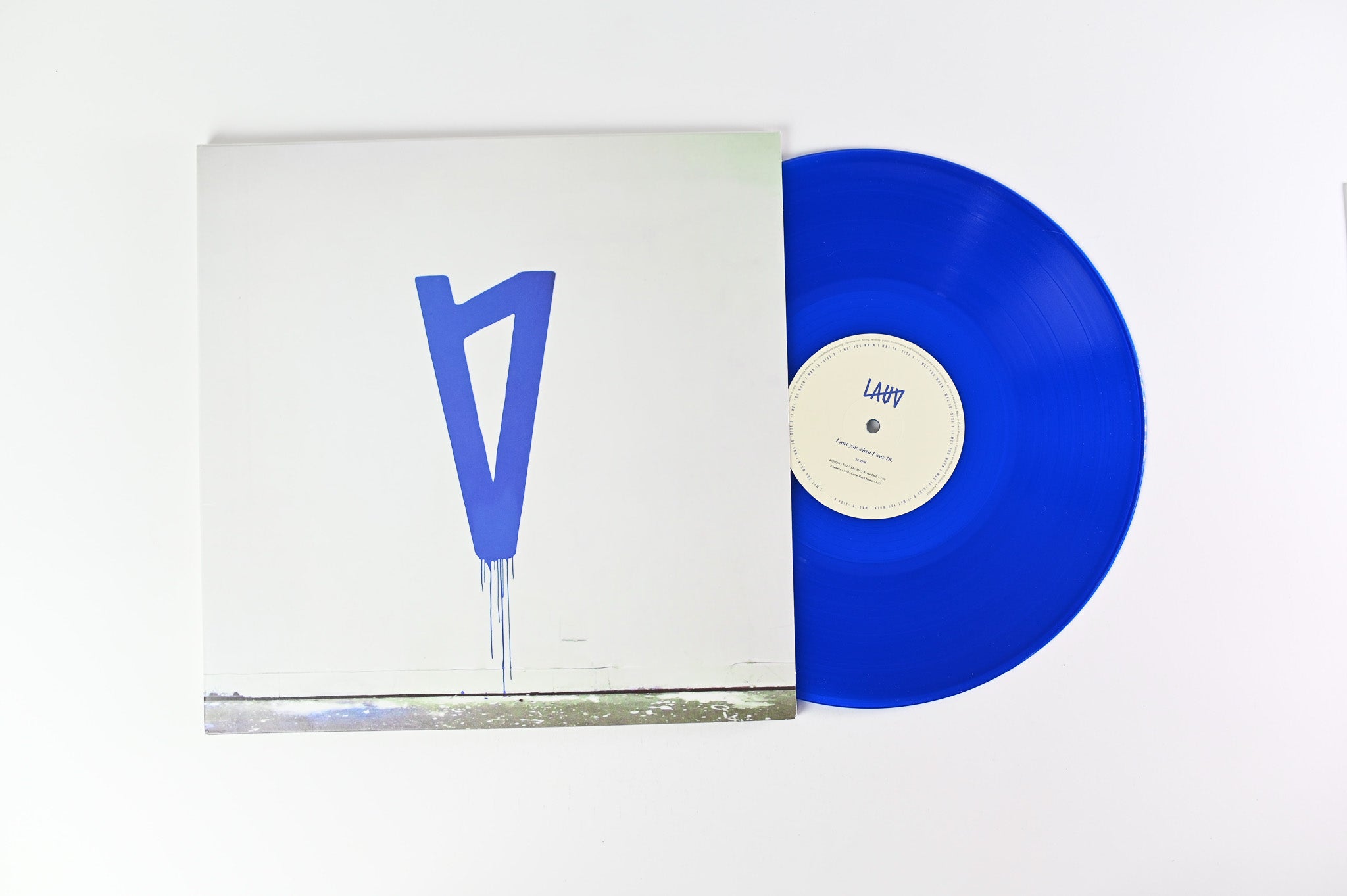 Lauv - I Met You When I Was 18. on Awal Ltd Blue Translucent Reissue