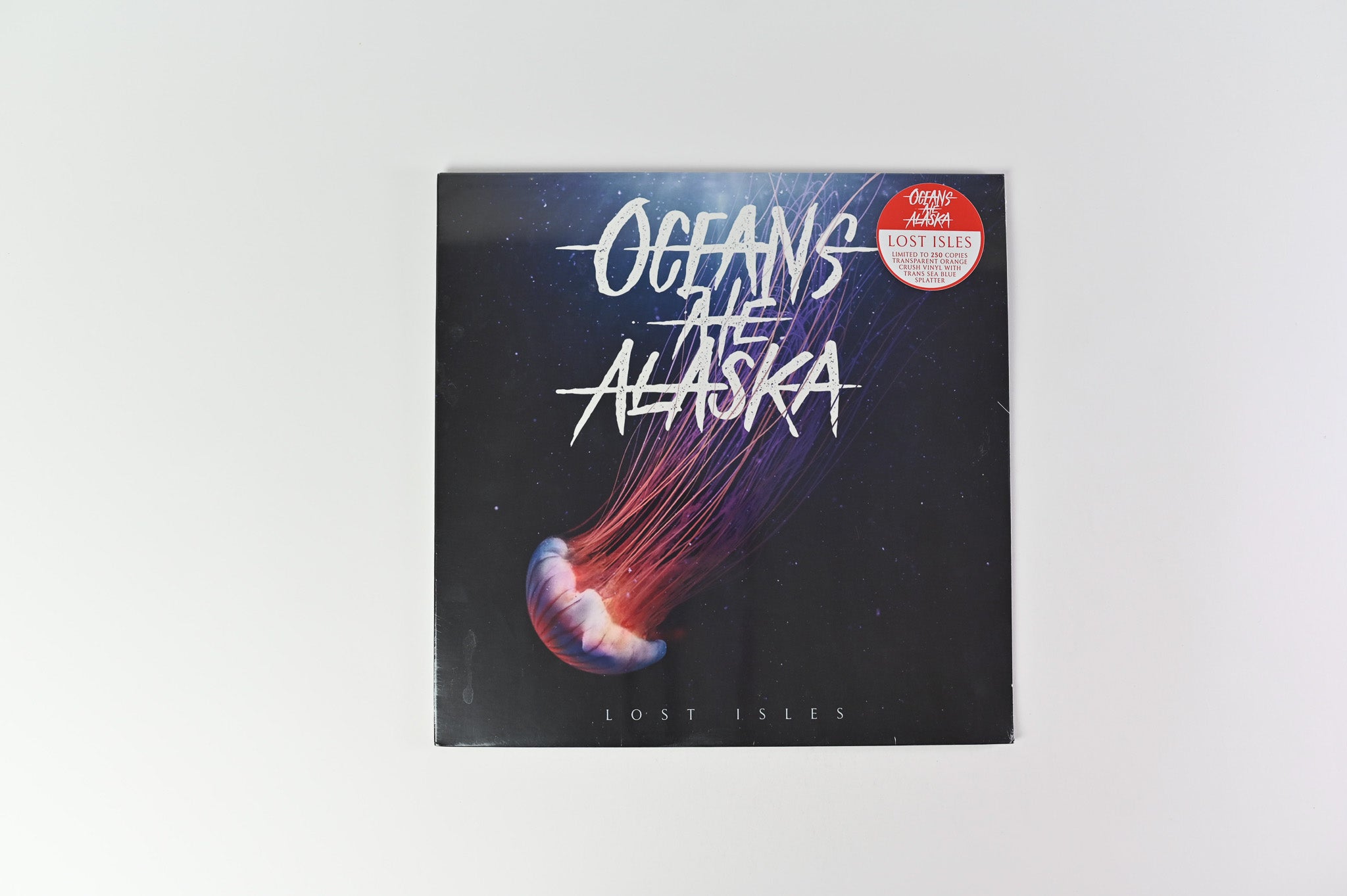 Oceans Ate Alaska - Lost Isles on Fearless Sealed Ltd Orange Translucent with Blue Splatter