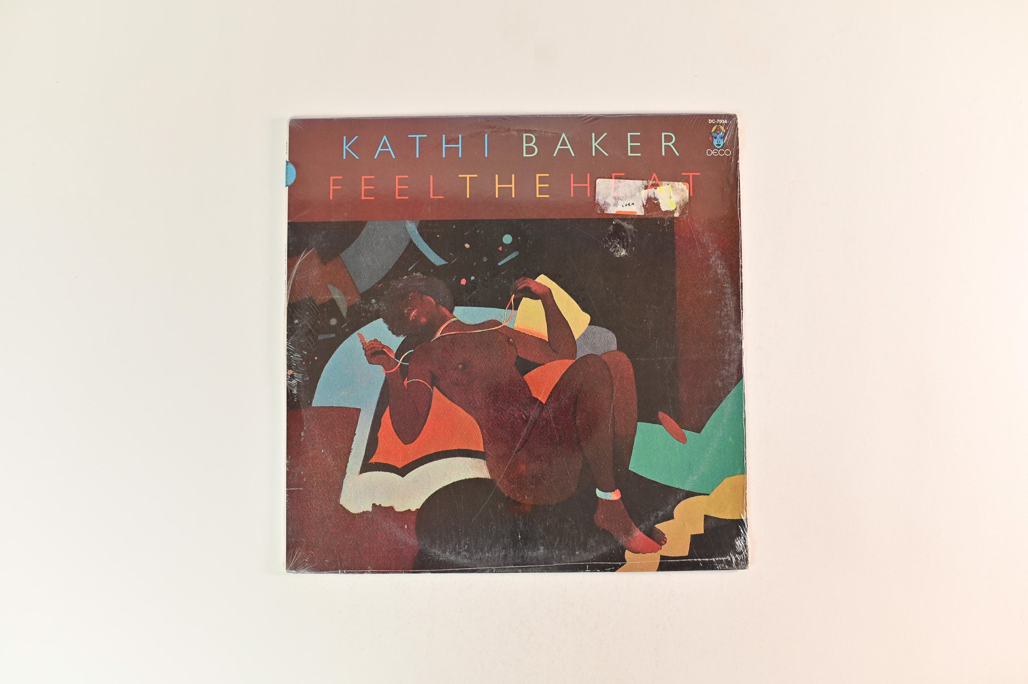 Kathi Baker - Feel The Heat on Deco Sealed