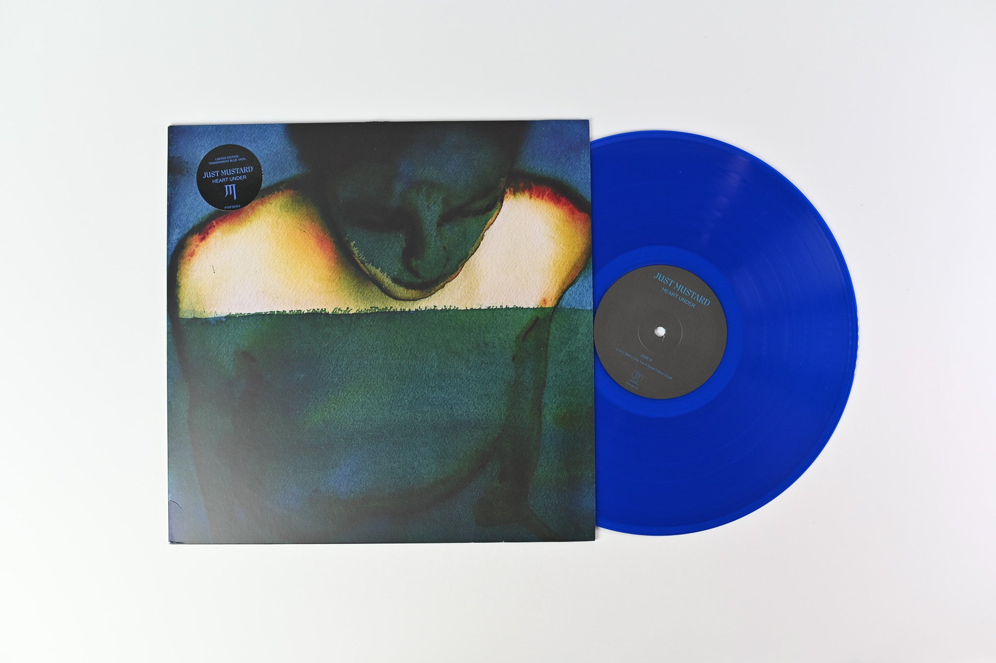Just Mustard - Heart Under on Partisan Records Blue Transparent Vinyl
