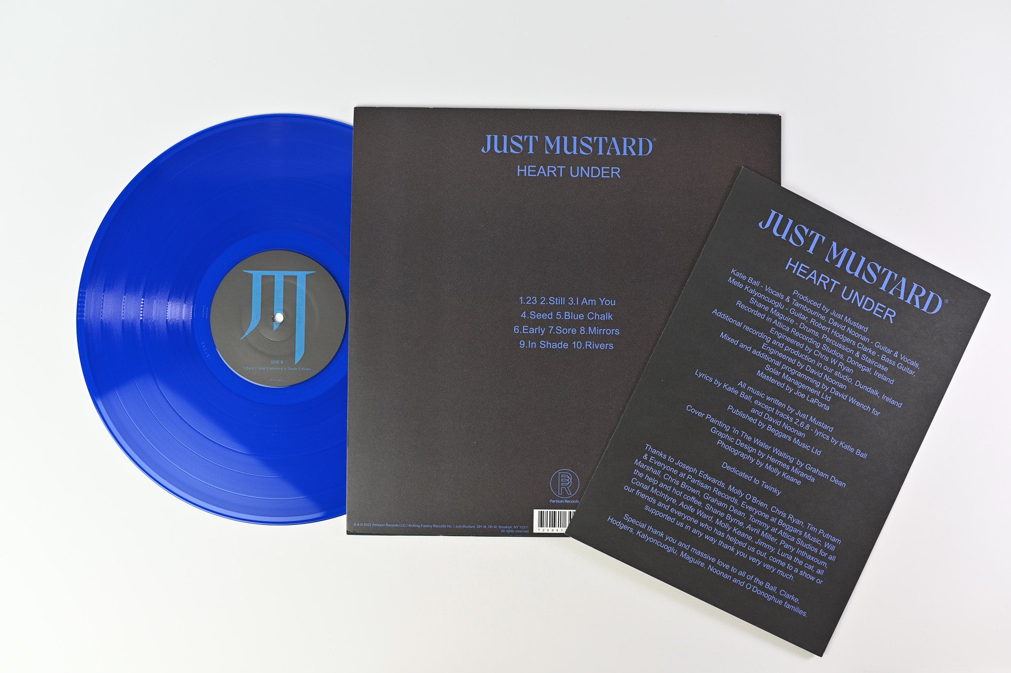 Just Mustard - Heart Under on Partisan Records Blue Transparent Vinyl