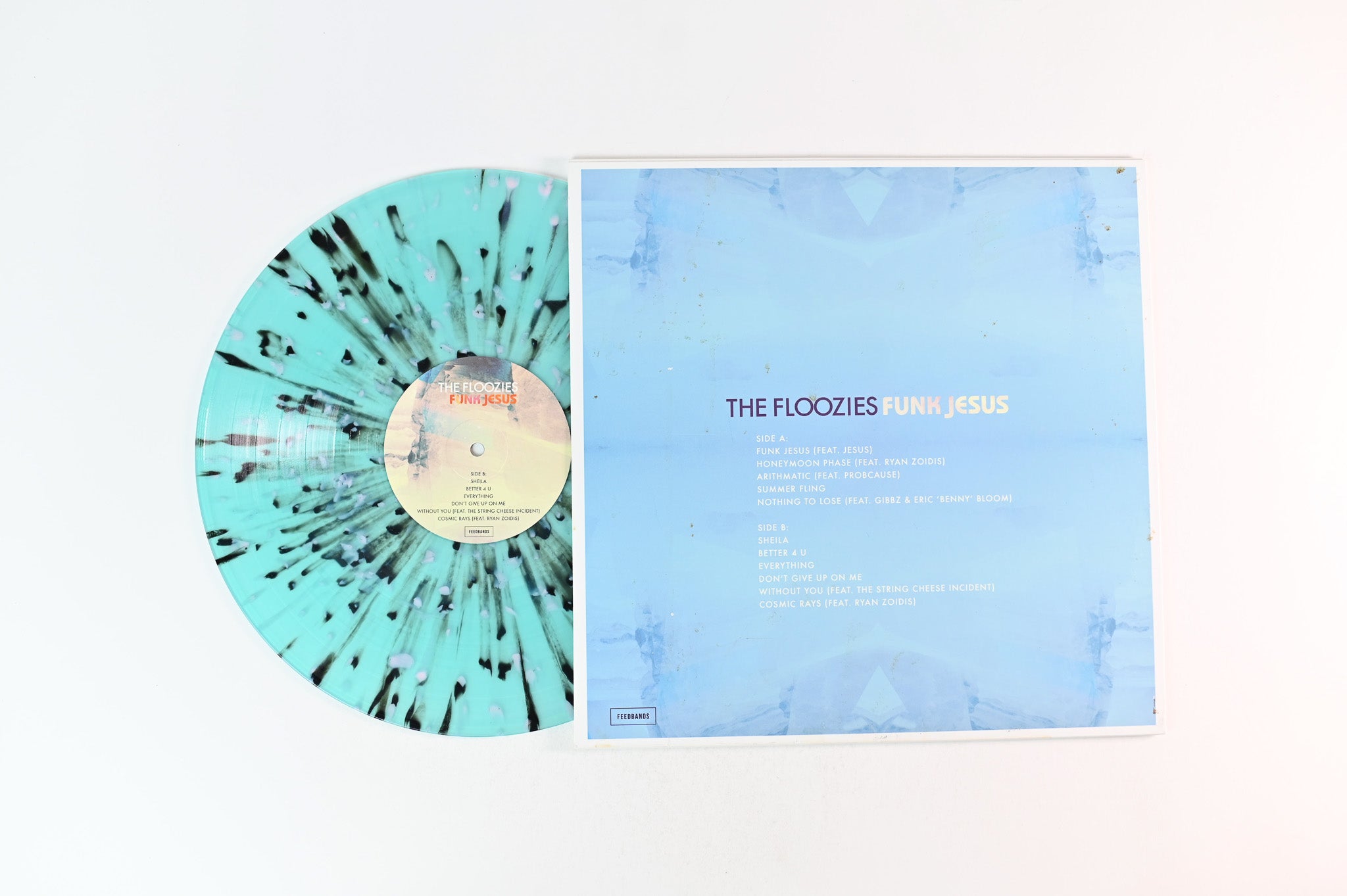 The Floozies - Funk Jesus Self Released Translucent Turqoise w/ Black & White Splatter