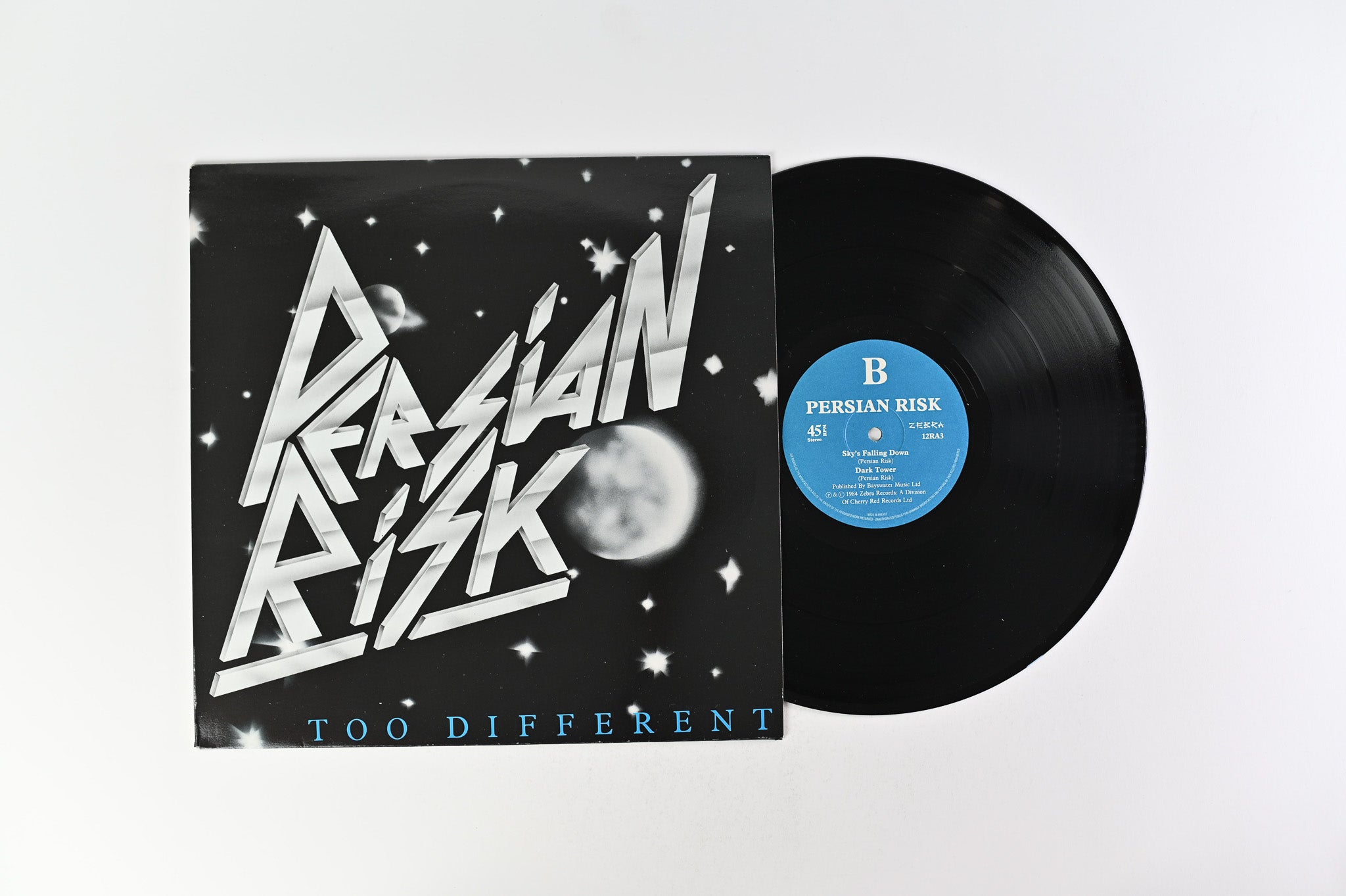 Persian Risk - Too Different on Zebra Records 45 RPM