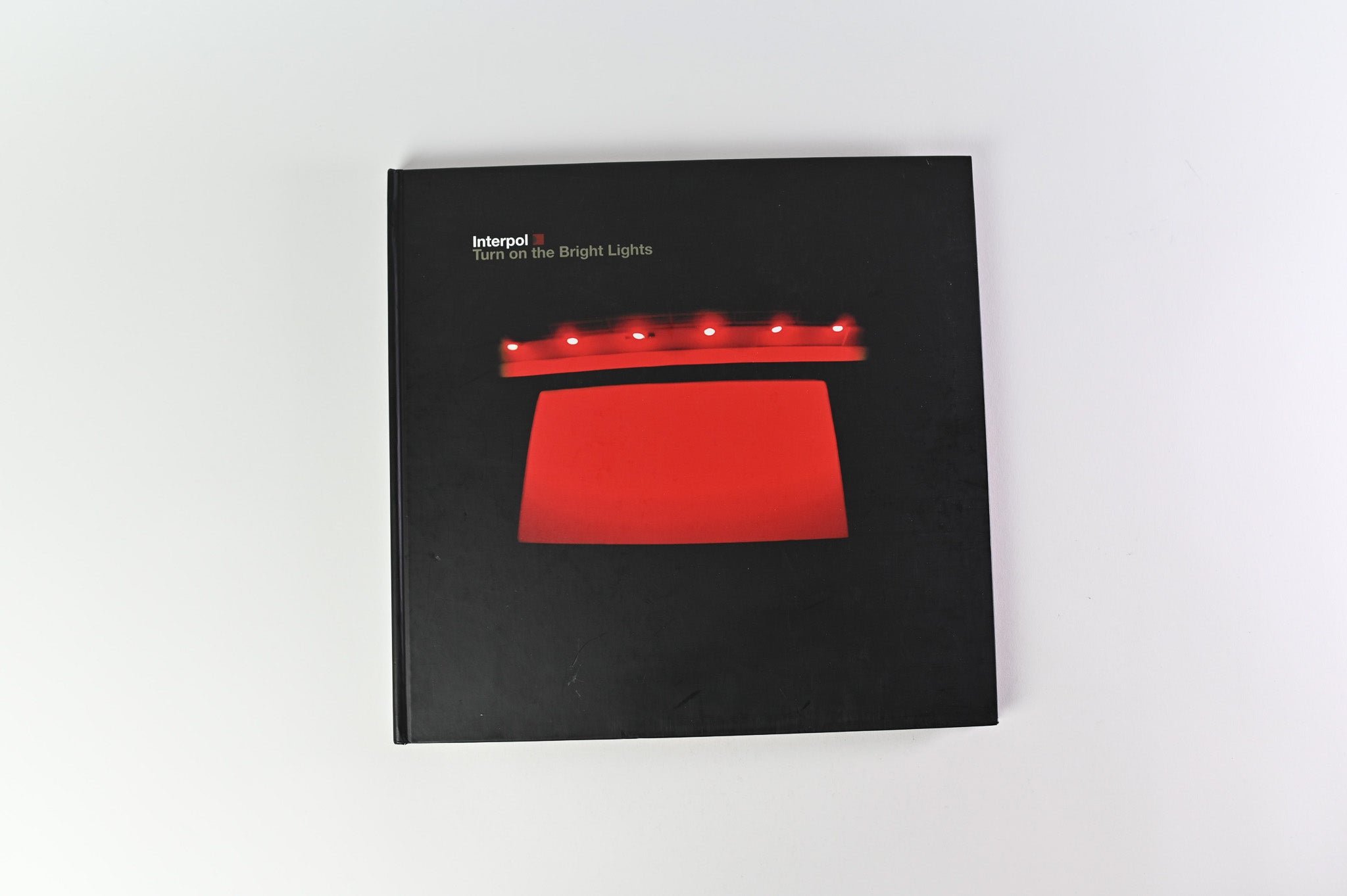 Interpol - Turn On The Bright Lights on Matador Super Deluxe Hardbound Book Package Reissue