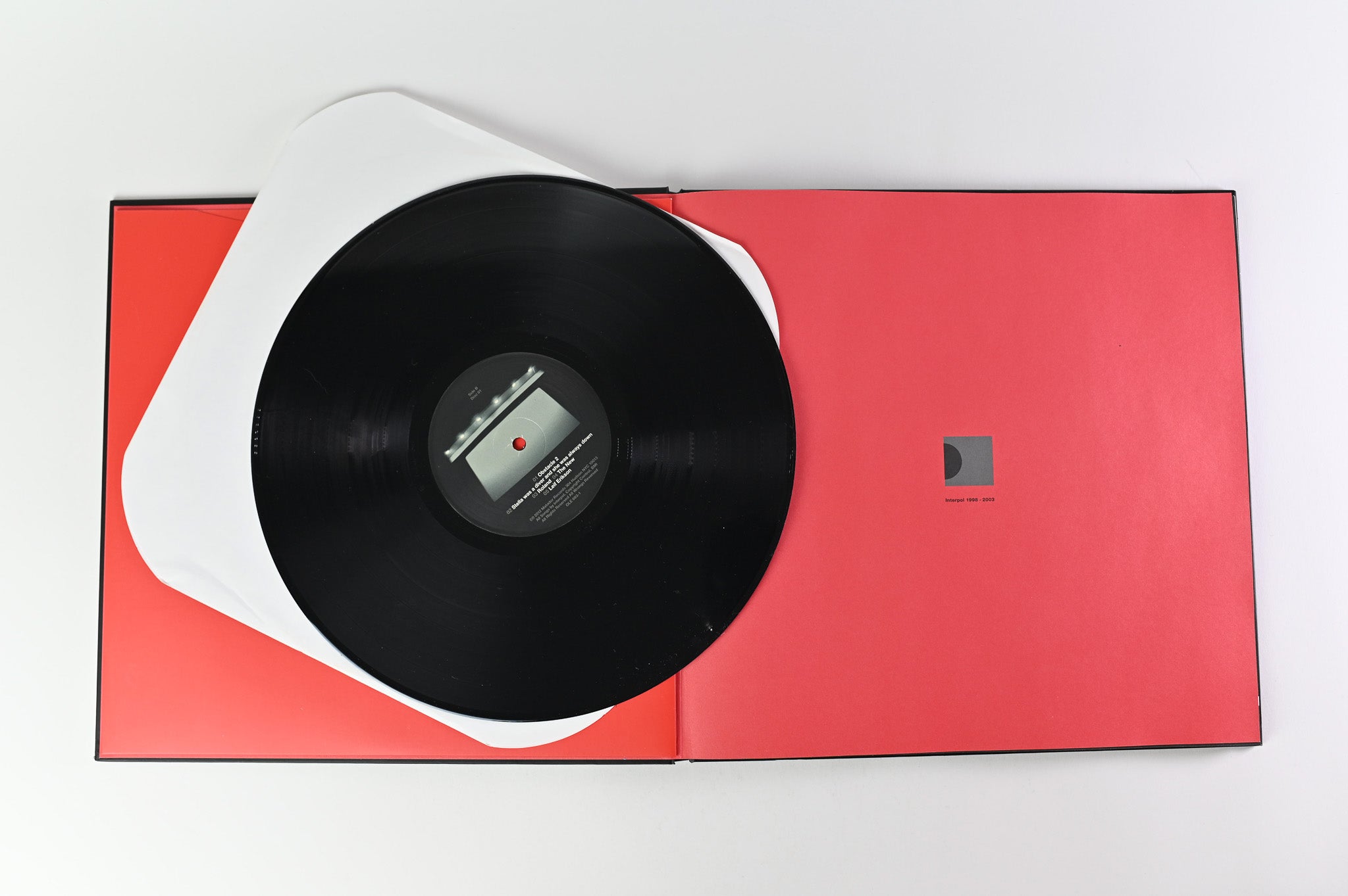 Interpol - Turn On The Bright Lights on Matador Super Deluxe Hardbound Book Package Reissue