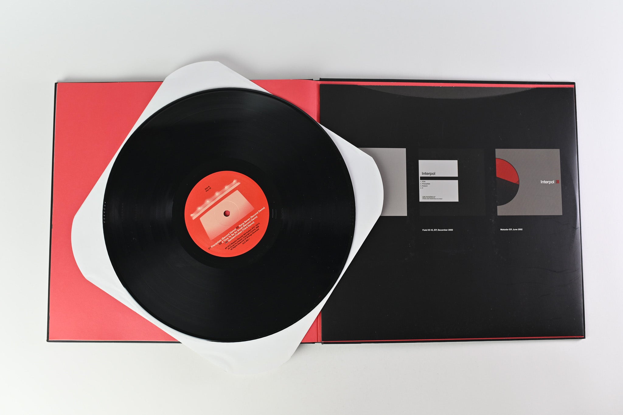 Interpol - Turn On The Bright Lights on Matador Super Deluxe Hardbound Book Package Reissue