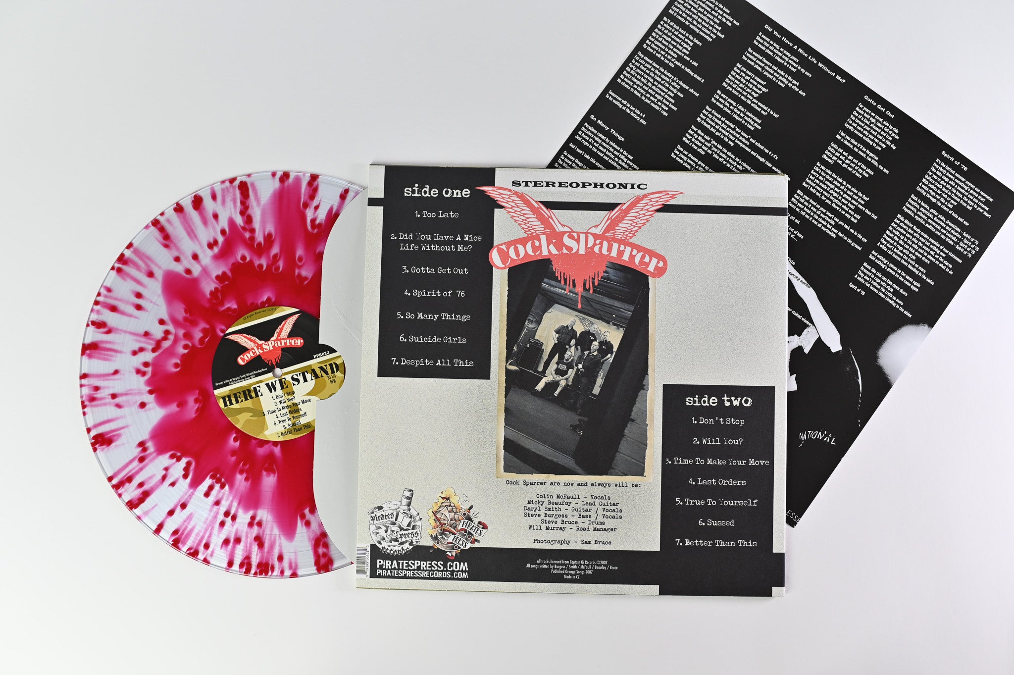 Cock Sparrer - Here We Stand Reissue on Pirate Press Records Clear w/Red Splatter