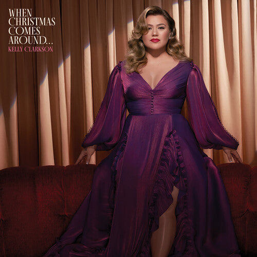 kelly clarkson purple dress Tis the season to be a little petty.  See Kelly Clarkson's official album  visualizer for 'When Christmas Comes Around...Again.'