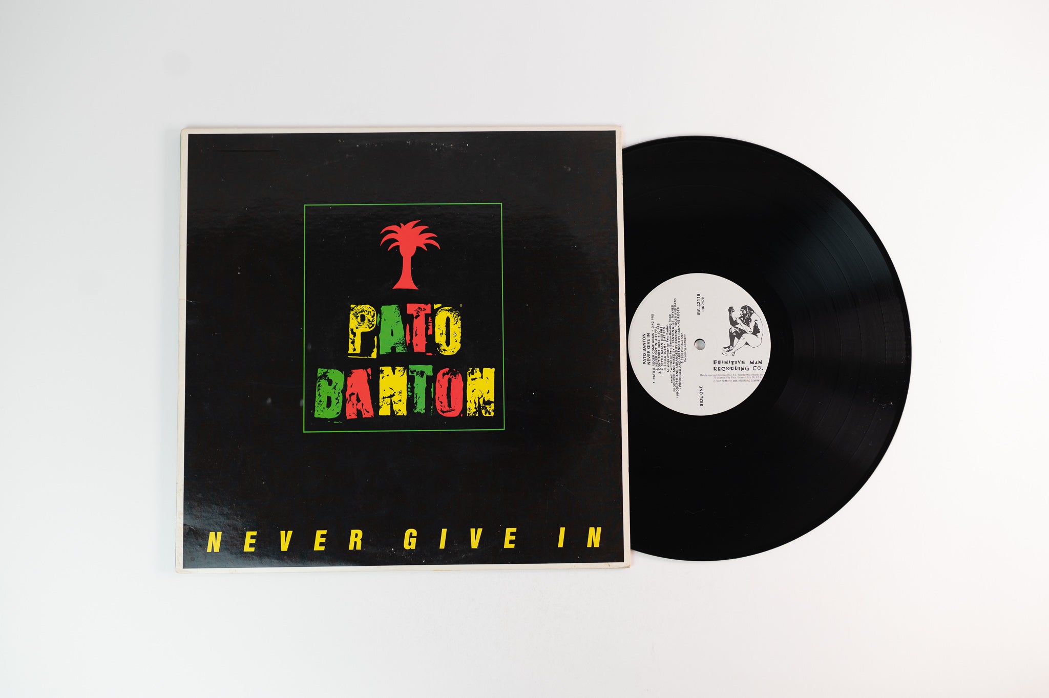 Pato Banton - Never Give In on Primitive Man Recording Company