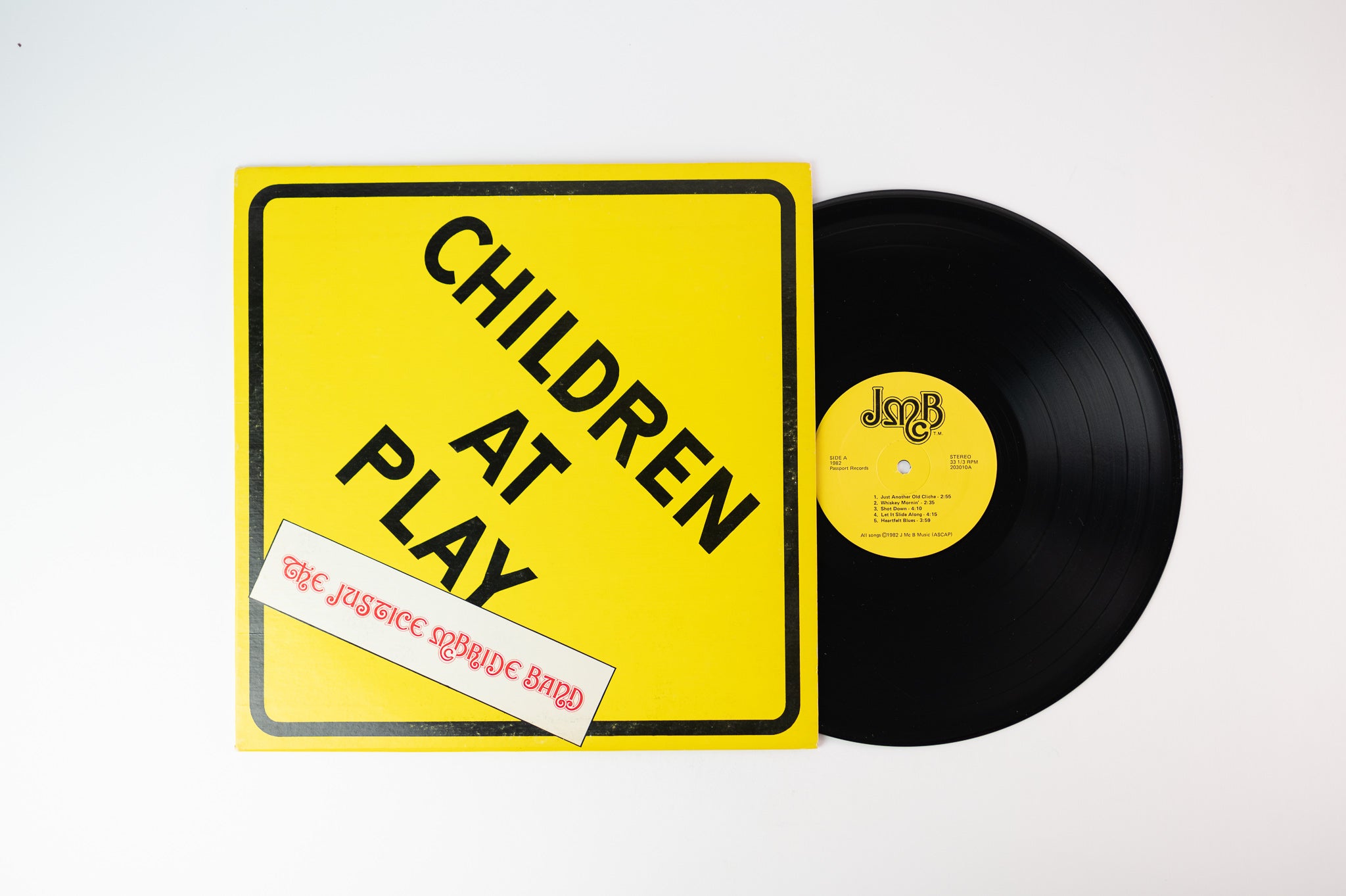 The Justice McBride Band - Children At Play on Passport Records - Private press