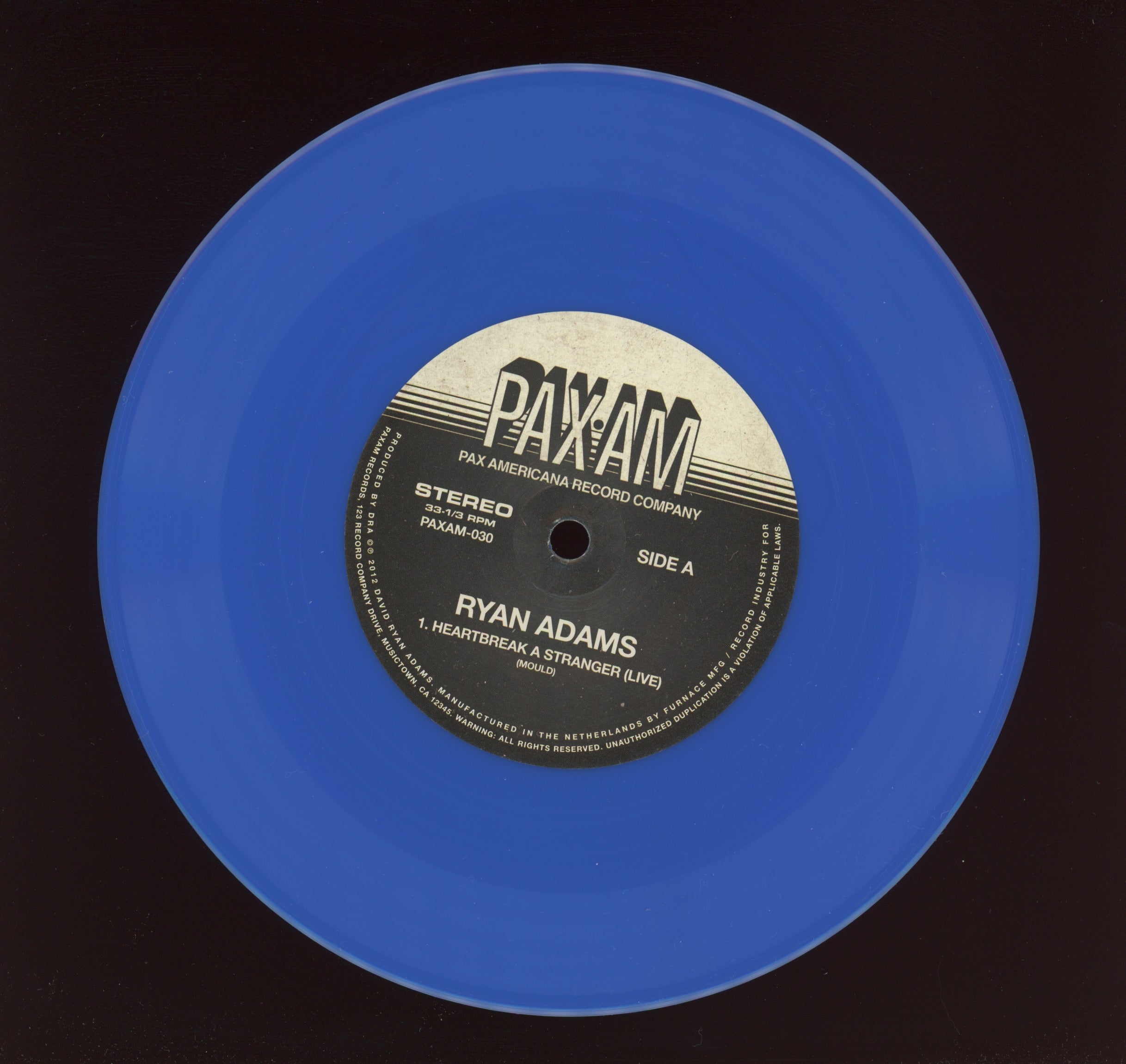 Ryan Adams - Heartbreak A Stranger / Black Sheets Of Rain on Pax Am RSD 2012 Ltd Blue 7"