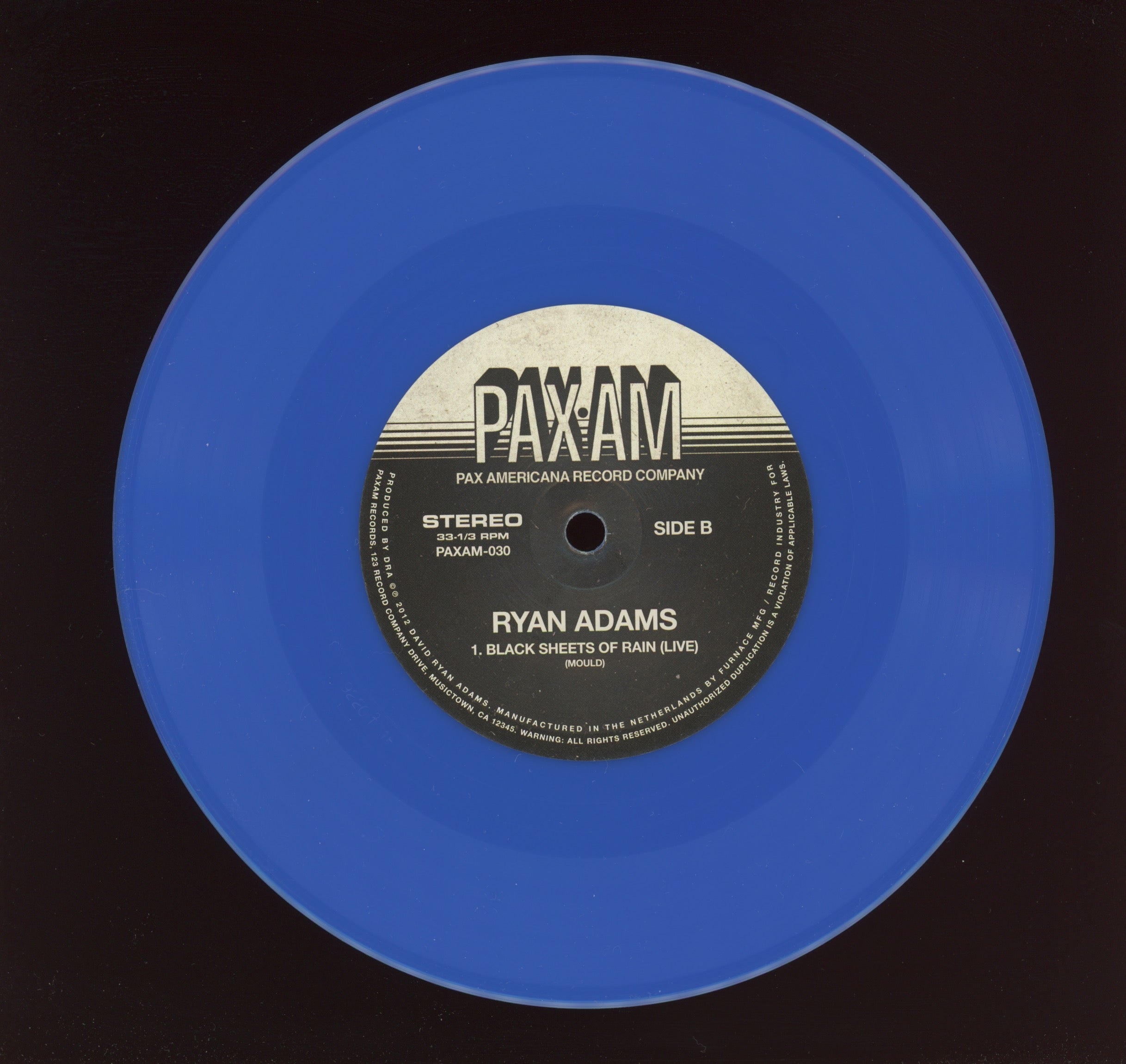 Ryan Adams - Heartbreak A Stranger / Black Sheets Of Rain on Pax Am RSD 2012 Ltd Blue 7"