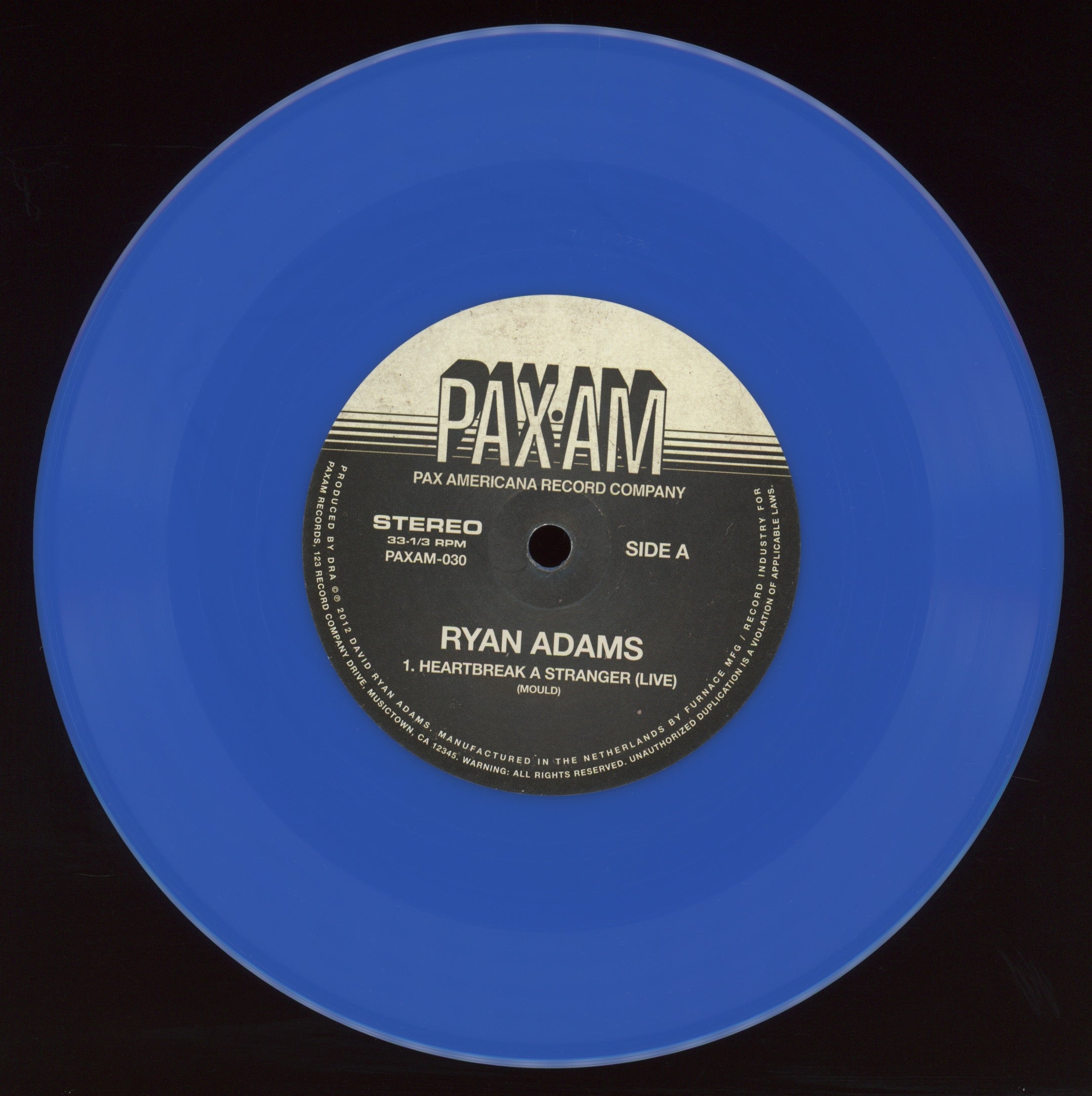 Ryan Adams - Heartbreak A Stranger / Black Sheets Of Rain on Pax Americana RSD 2012 Ltd Blue Vinyl 7" With Picture Sleeve